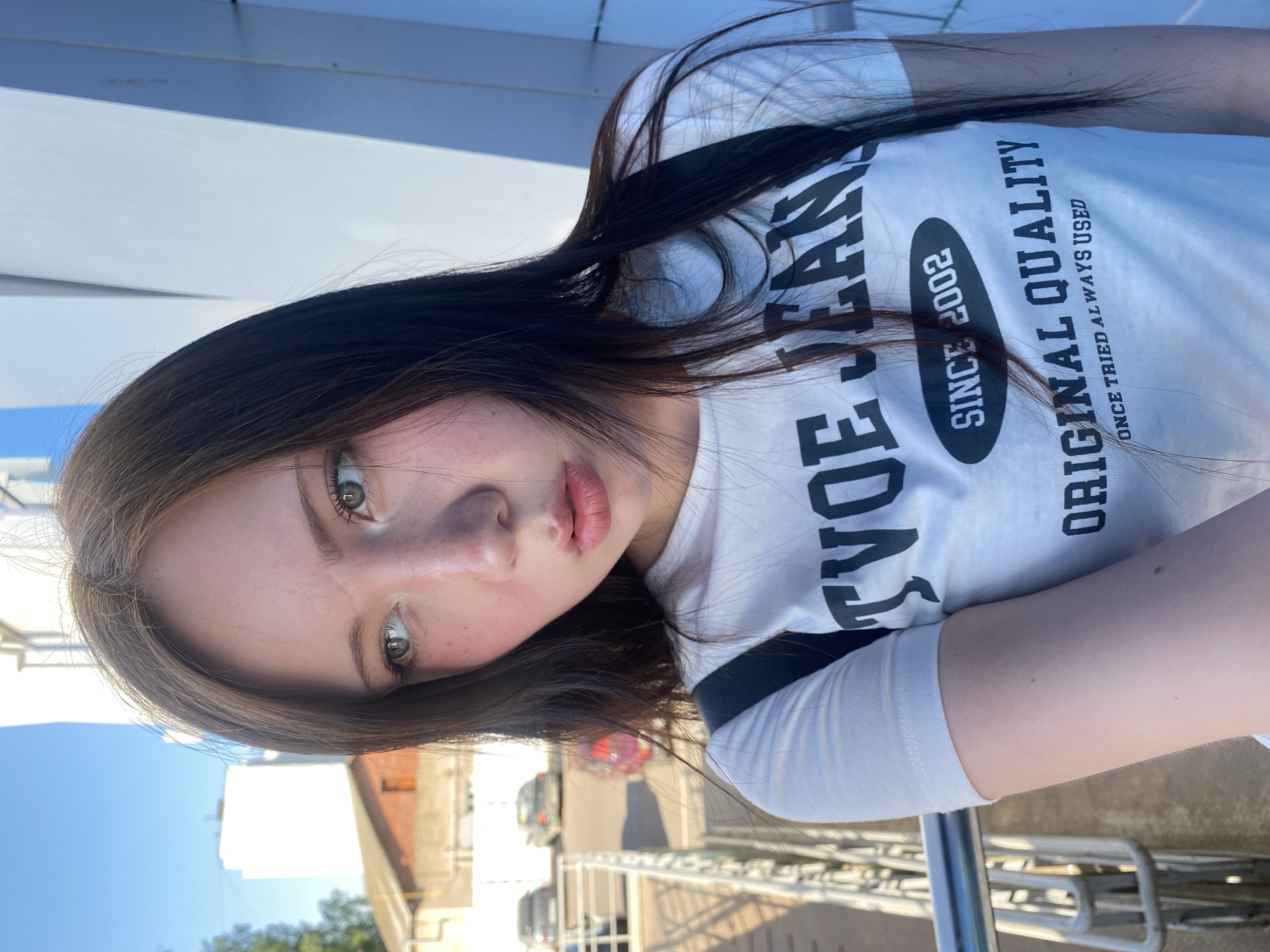 Woman documents routine day through selfies across urban locations