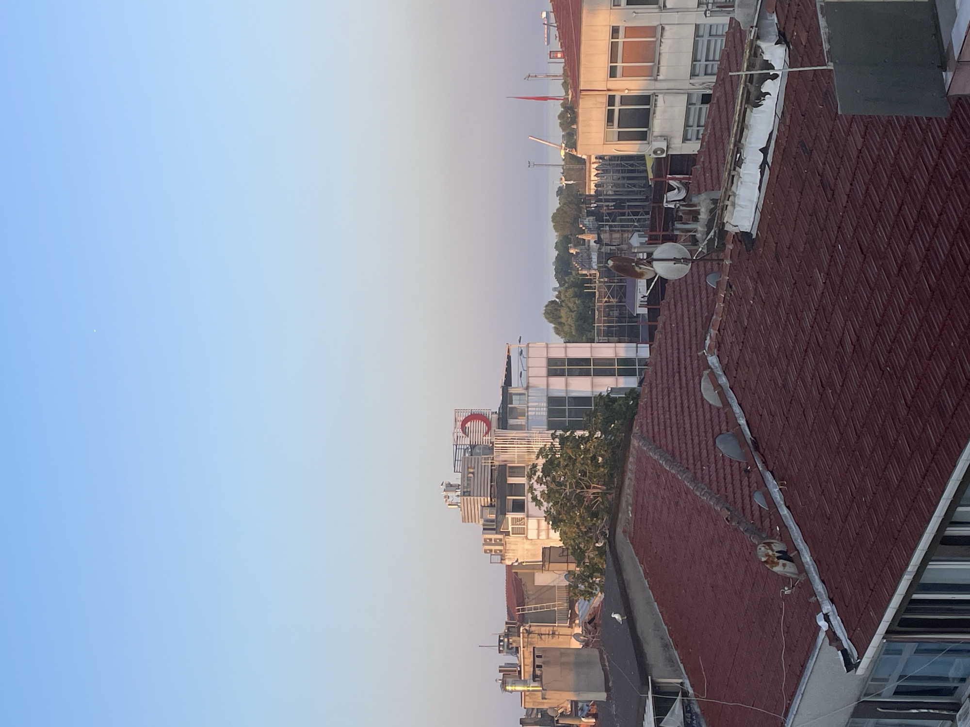 Kadıköy rooftop at dawn, Bosphorus and old streets below