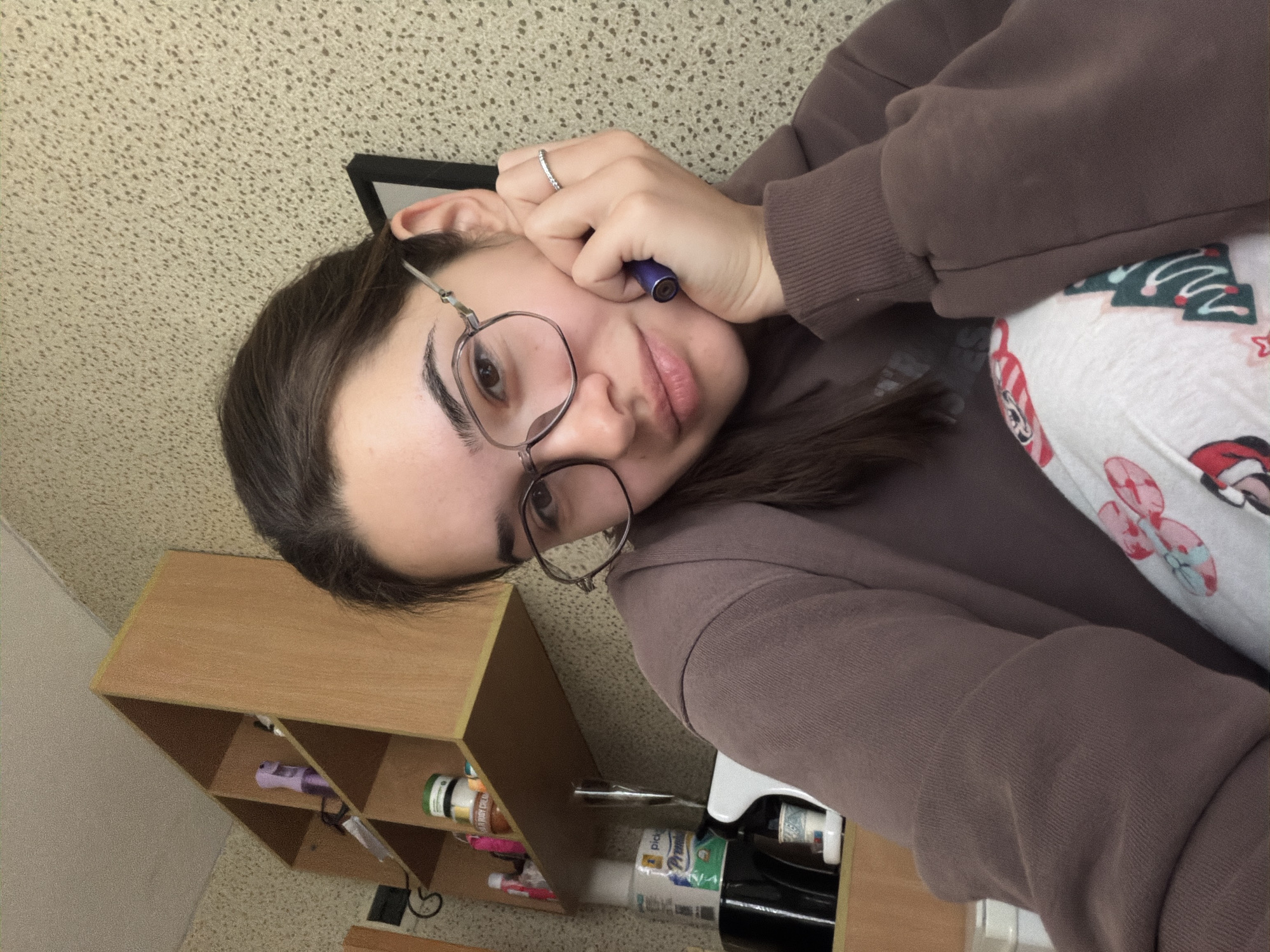 Young woman takes casual selfies indoors in Sofia
