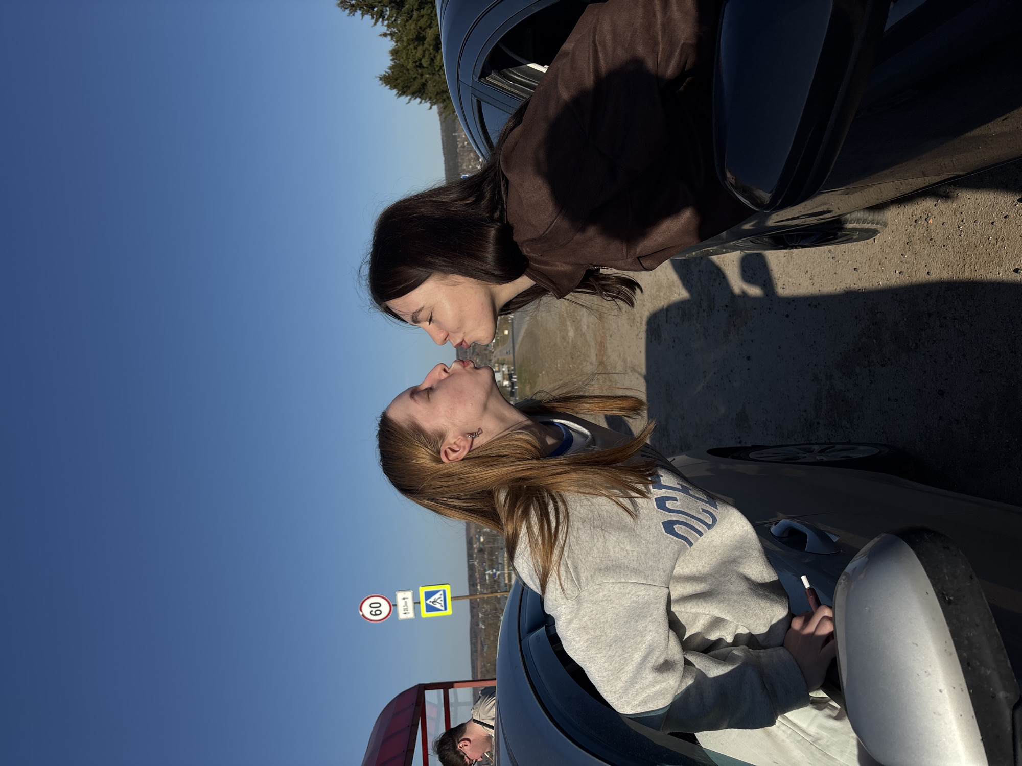 Casual social interactions observed in Russian village parking area