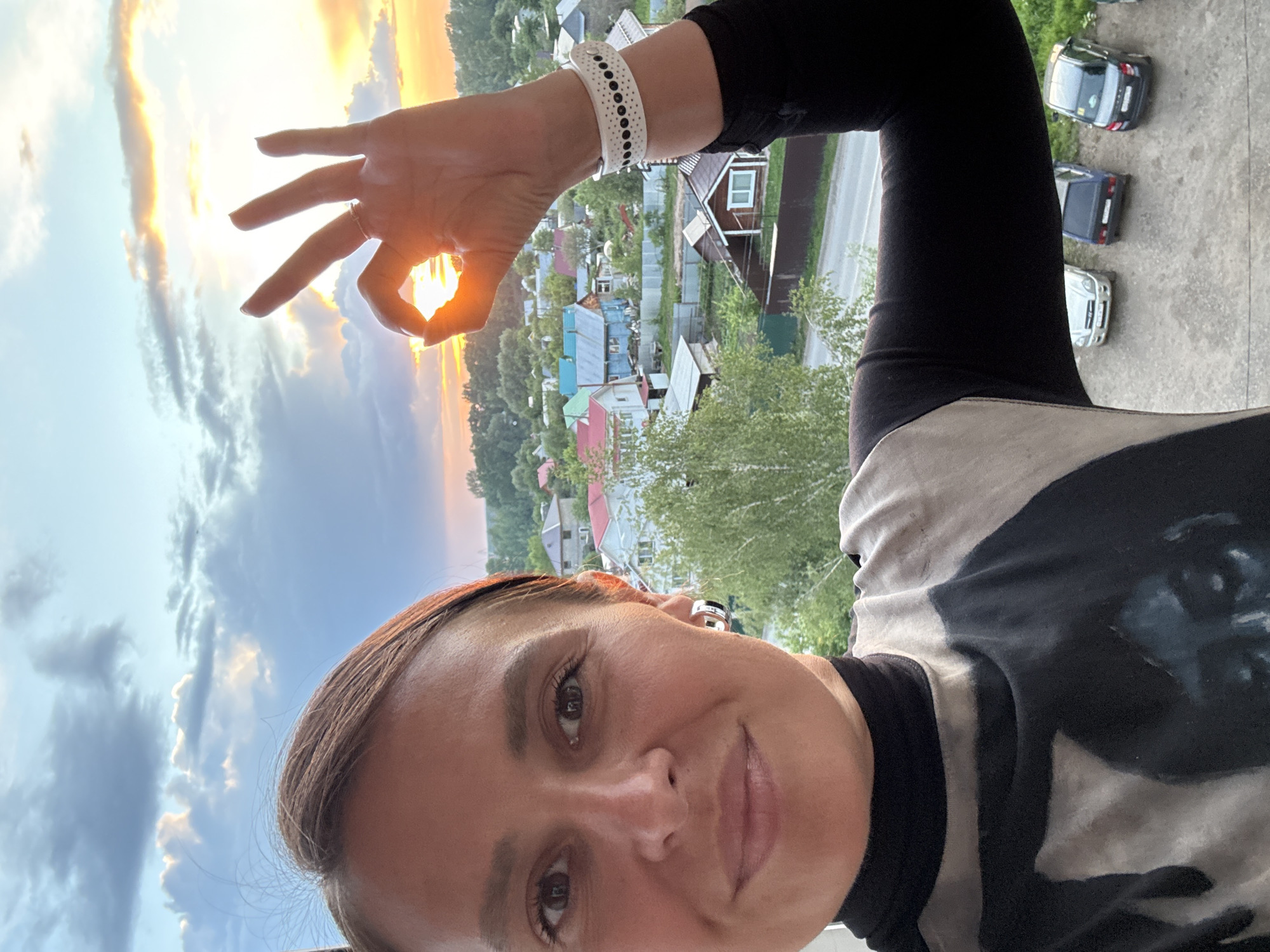 Woman documents sunset moment in Chaikovsky through selfies
