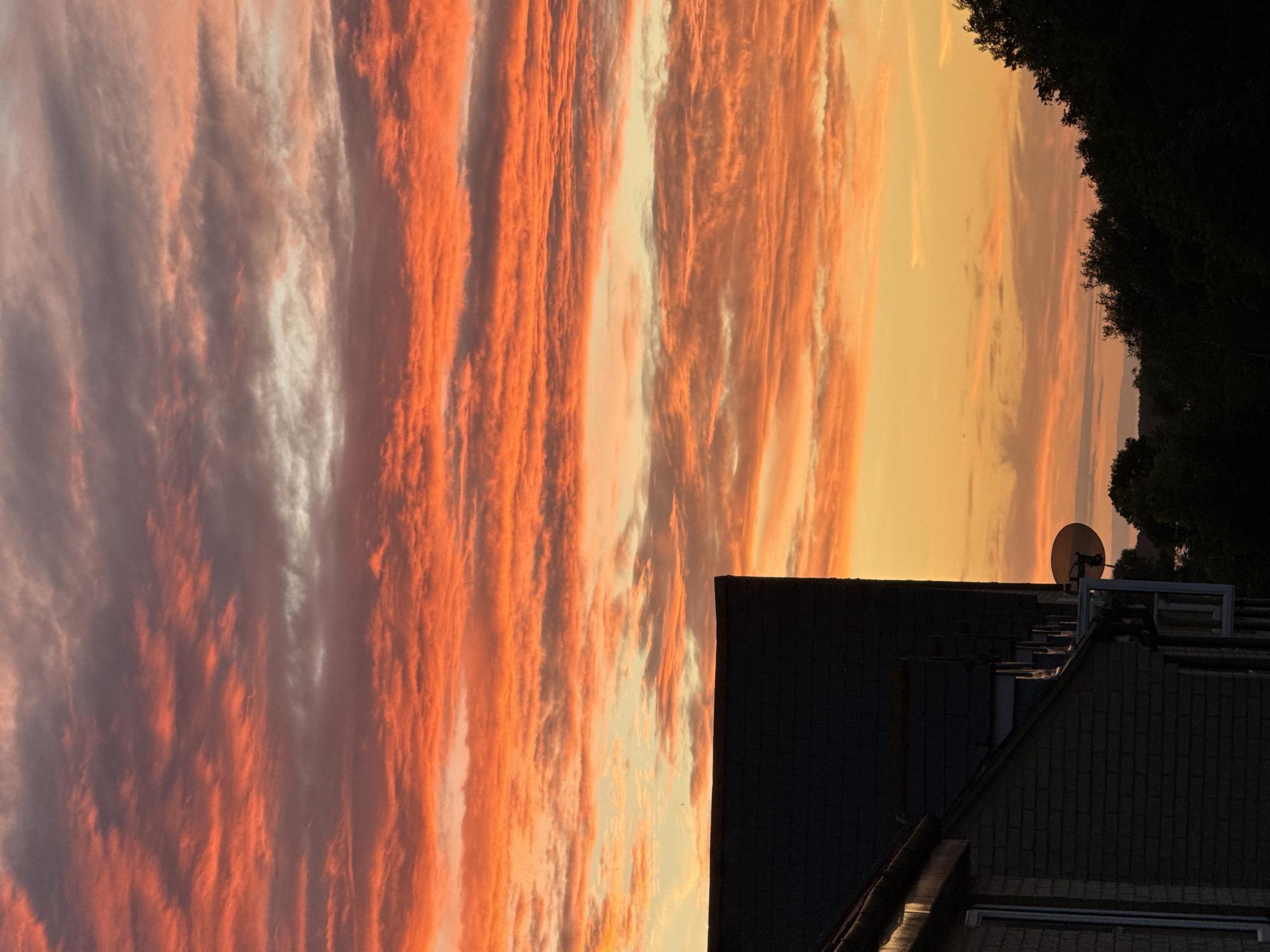 Bright summer sunset over Great Yarmouth rooftops