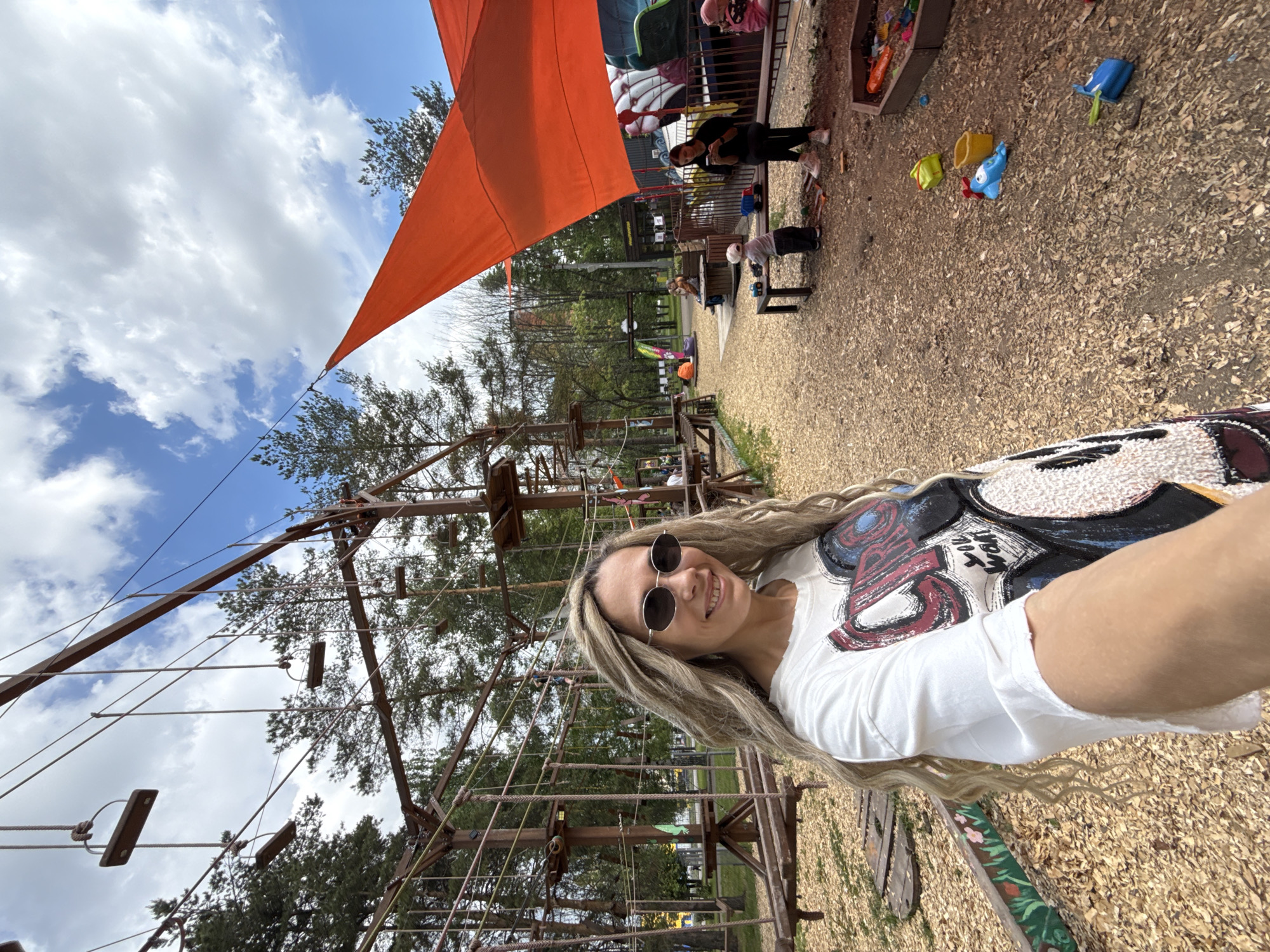 Woman enjoys sunny day at Russian adventure park