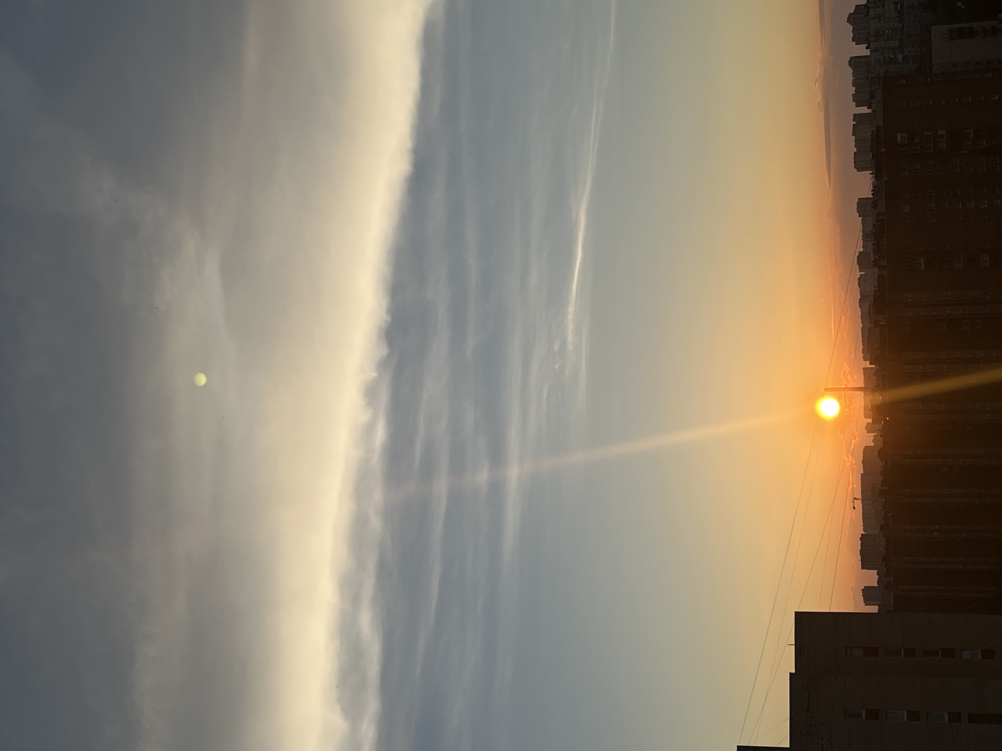 Midsummer sunset over Sinyavino apartment blocks, plus home life glimpses