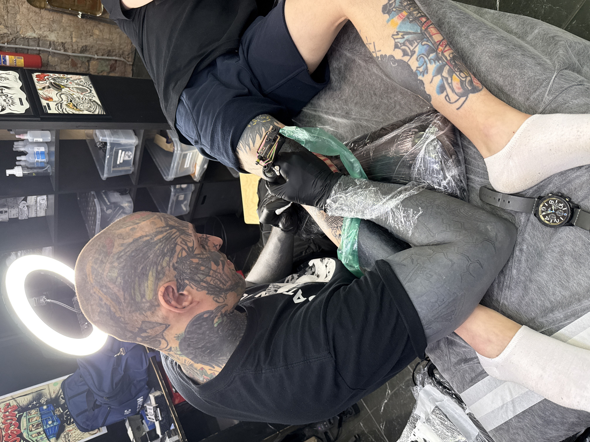 Tattoo session documented at Moscow studio