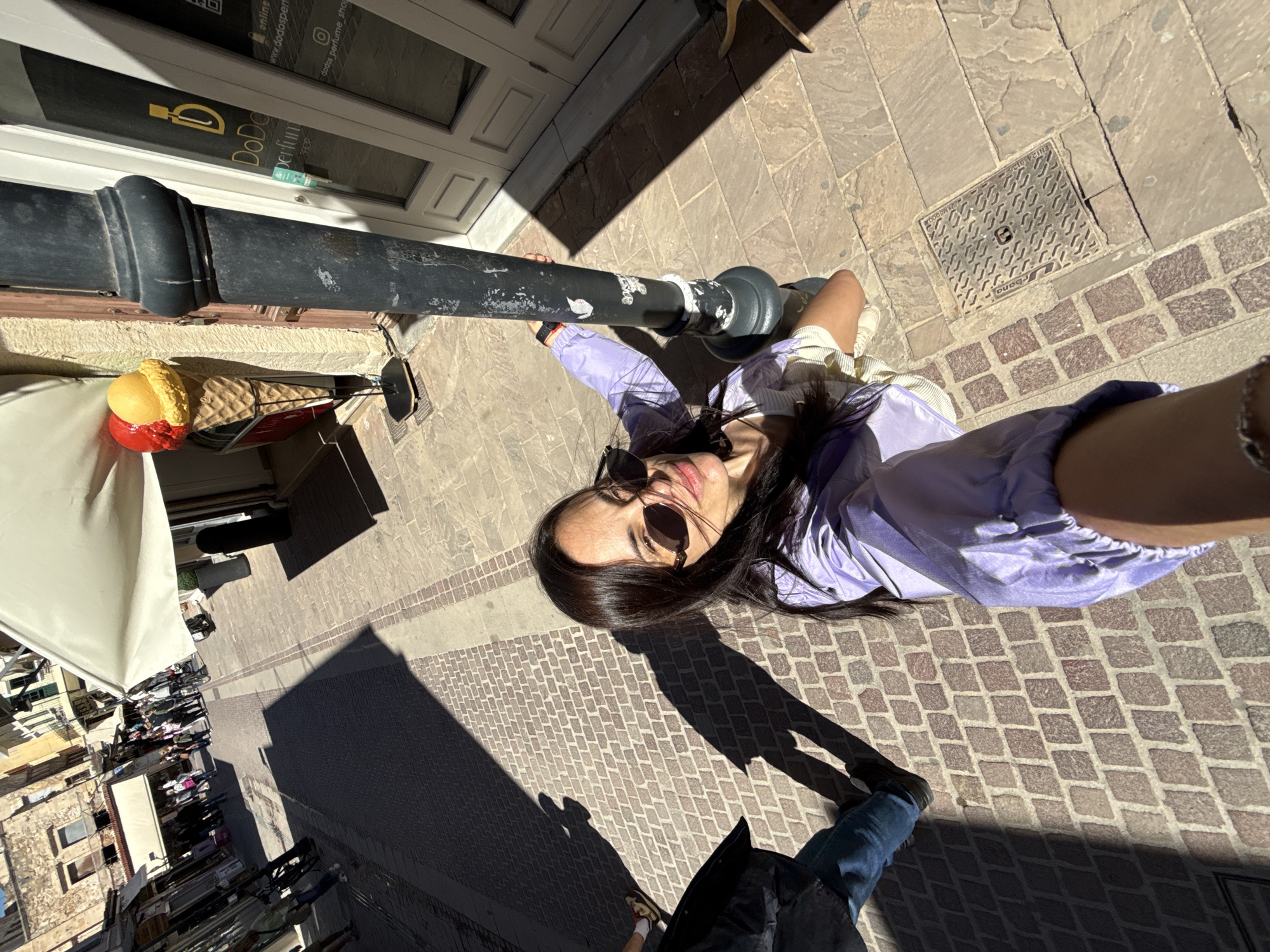 Tourist documents morning stroll through historic Chania waterfront district