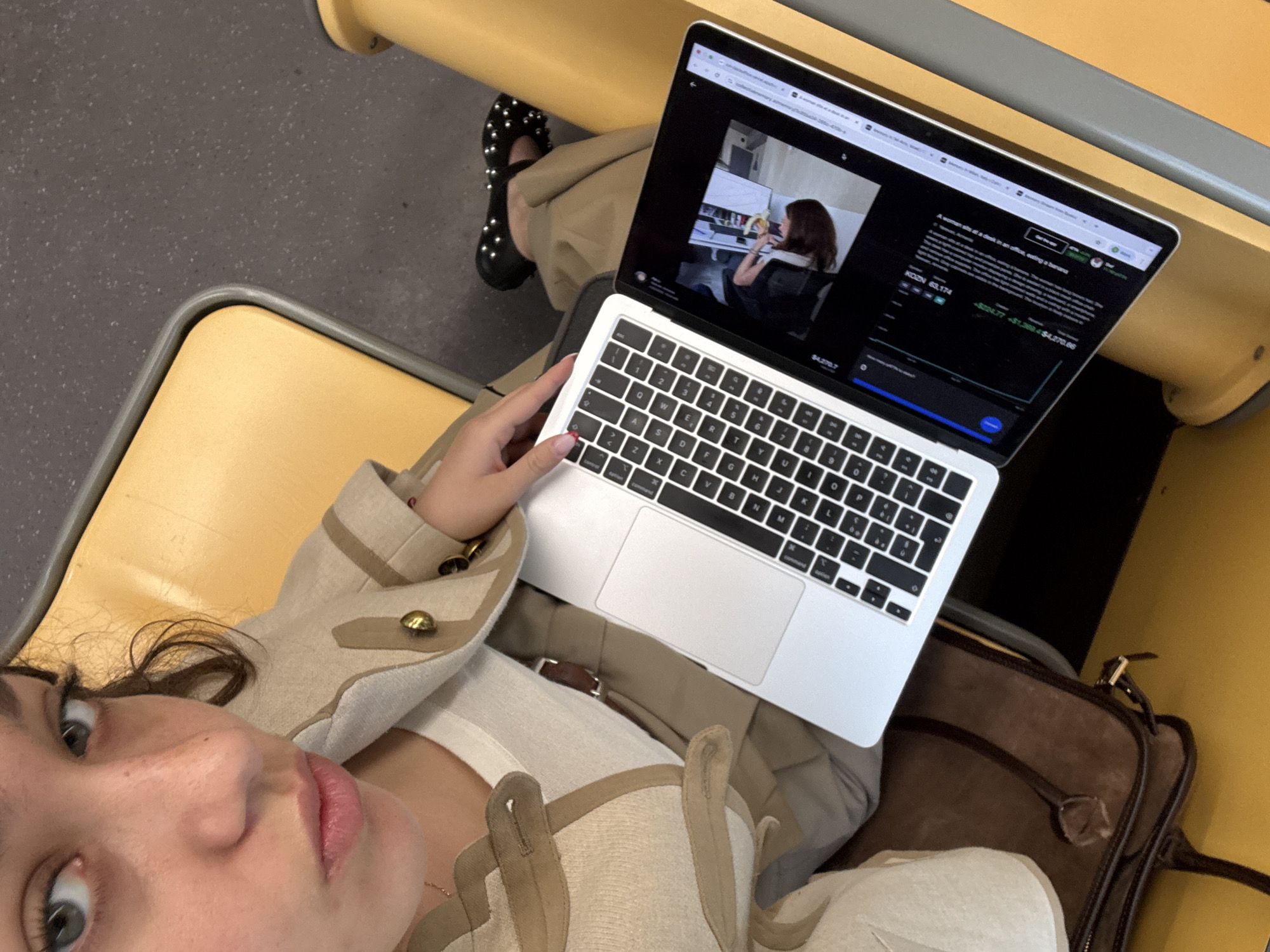 Woman takes selfie on Milan public transport