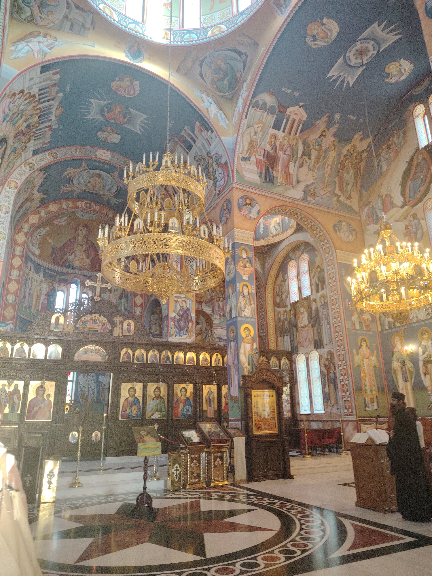 Cathedral interior with religious murals documented by witness