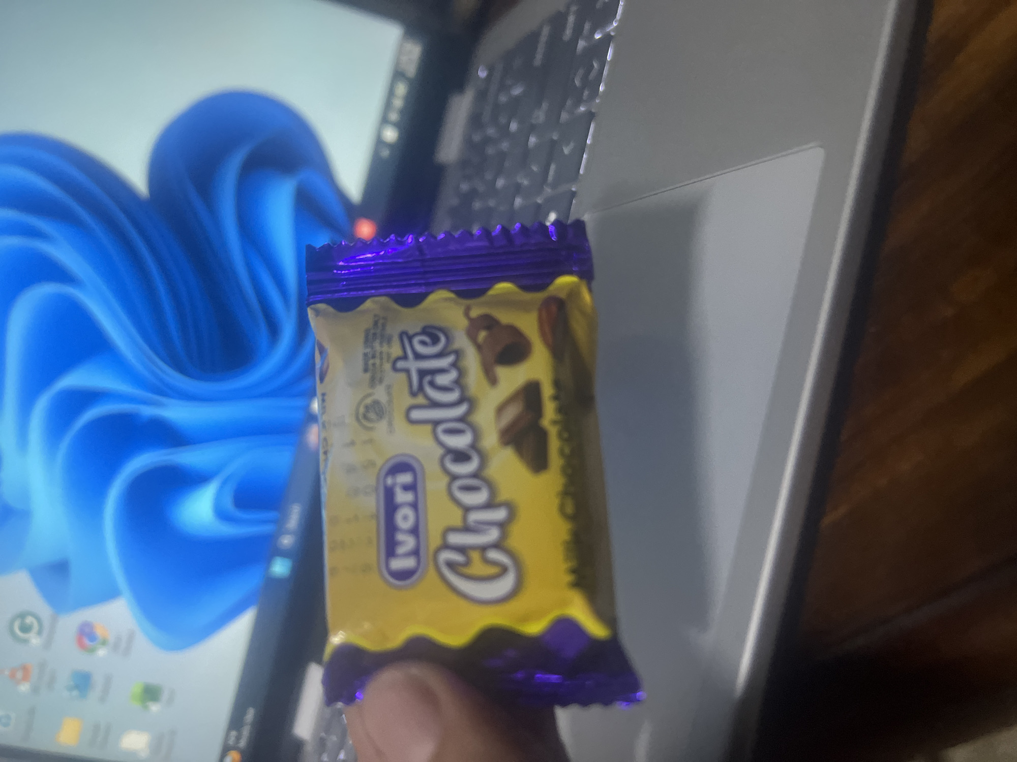 Person holds Ivori chocolate bar in Dar es-Salaam