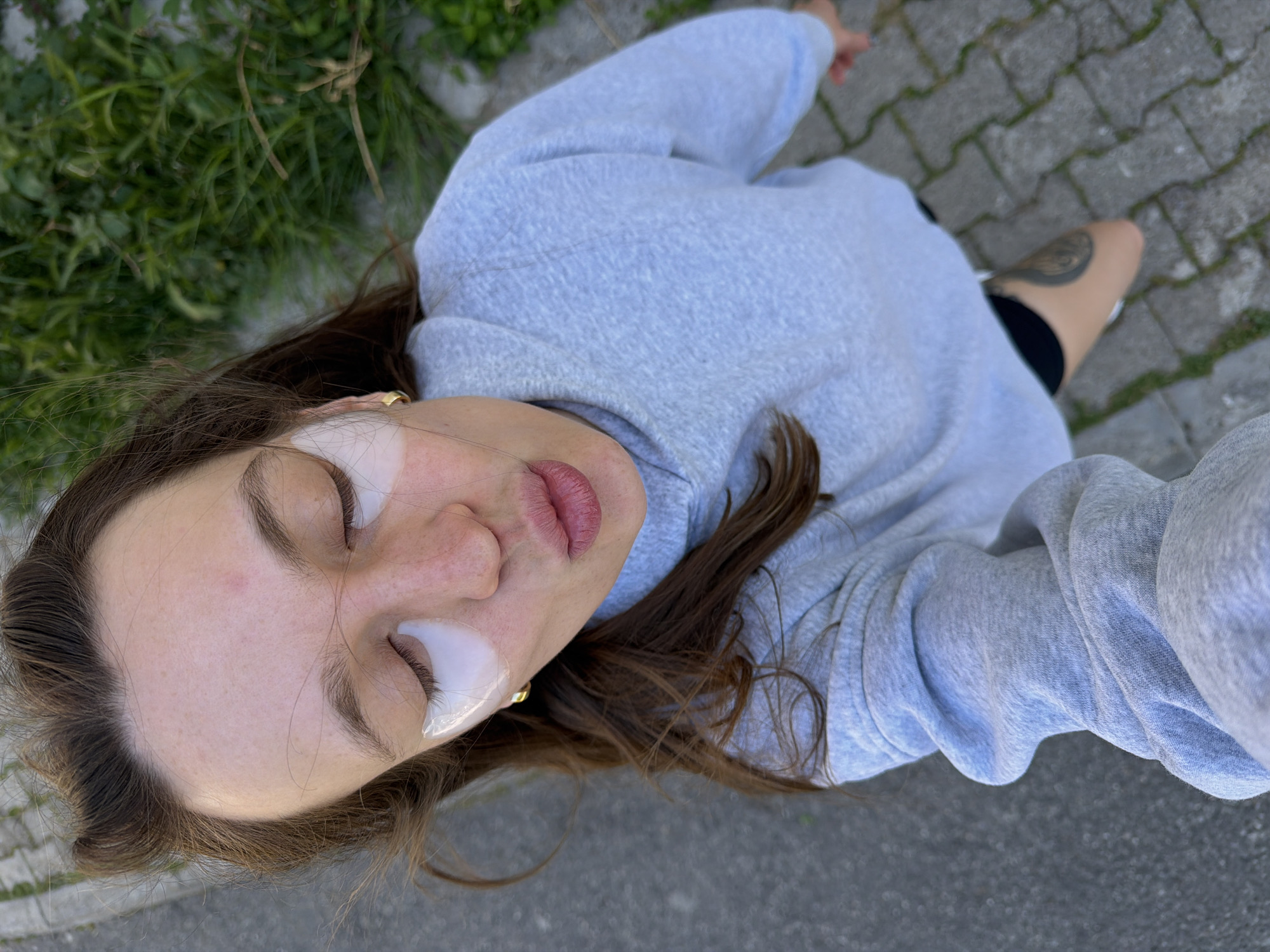 Woman films selfie content around Budva, Montenegro with dog