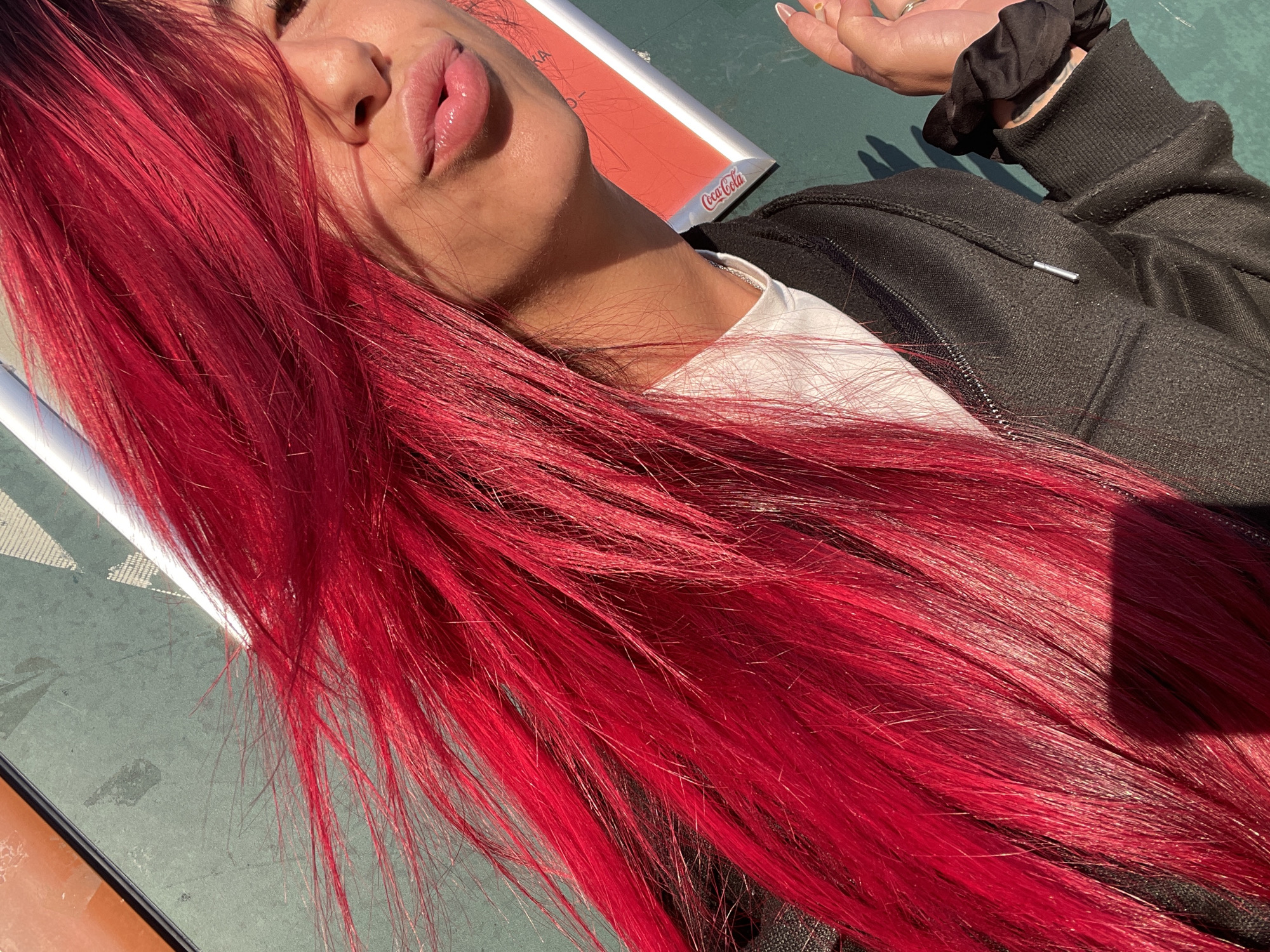 Red-haired figure on a Sofia street at dawn
