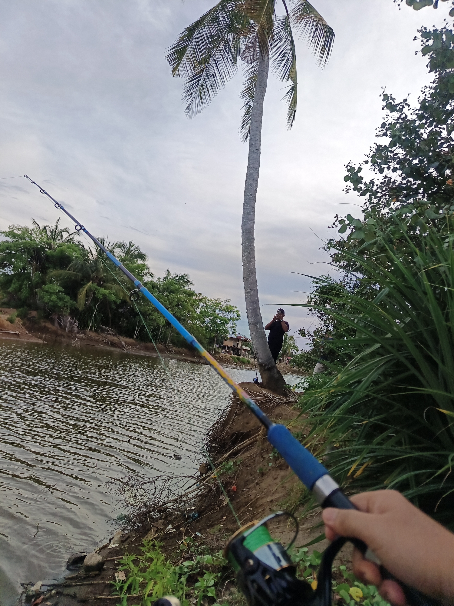 Riverside fishing session with nature close-ups, Lhokseumawe