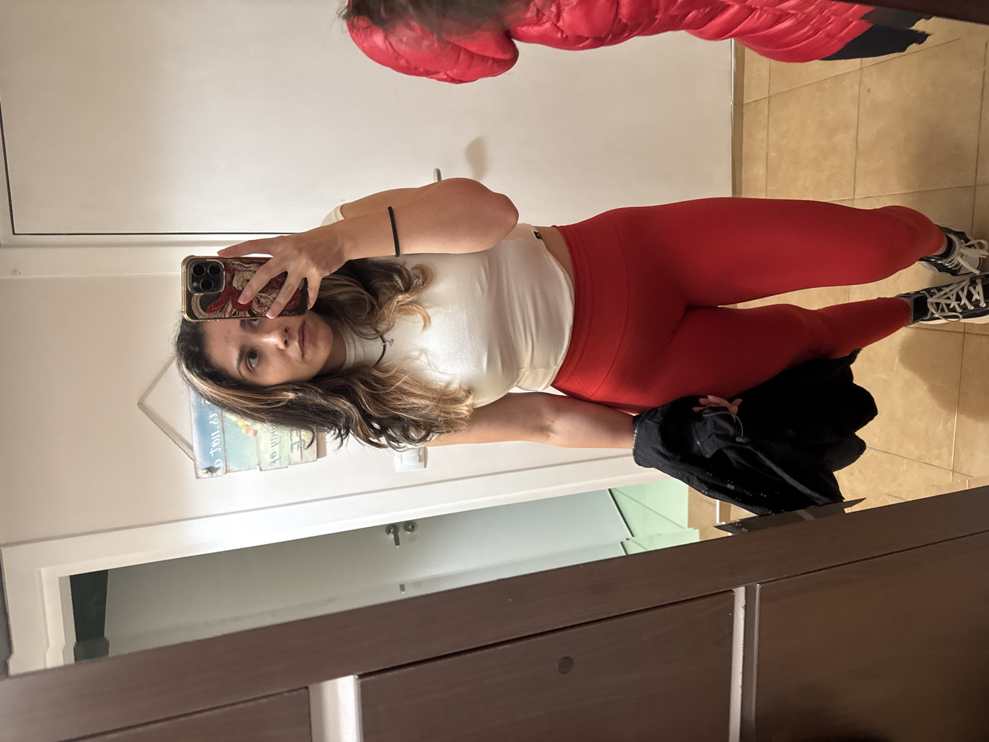 Woman takes mirror selfie in Sofia apartment