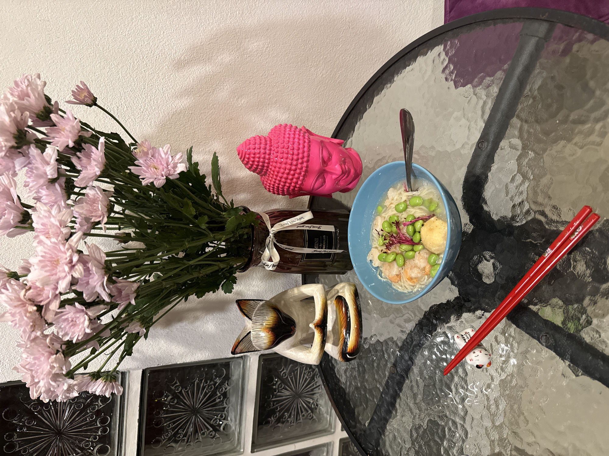 Ramen dinner documented with decorative table setting in Thailand
