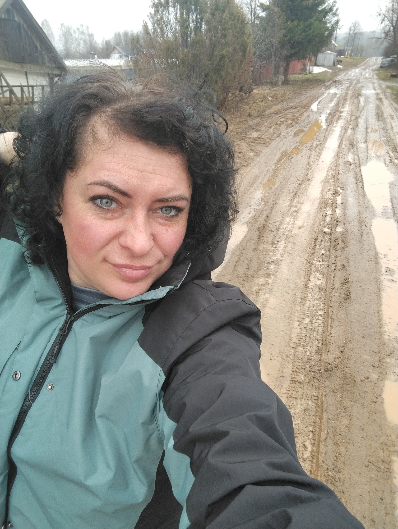 Woman takes morning selfie in rural Russian village