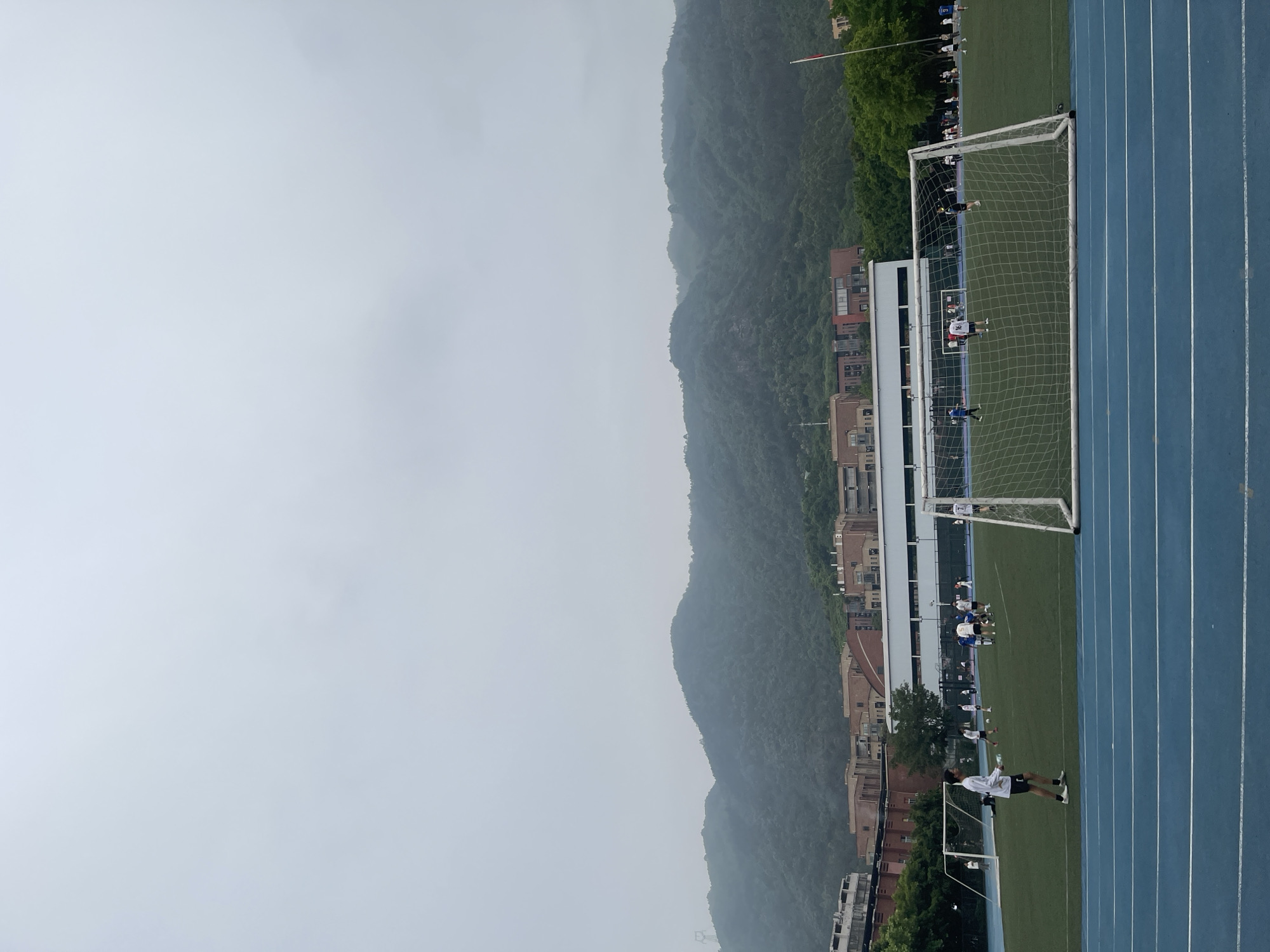 Soccer match underway at Bishan sports complex, China