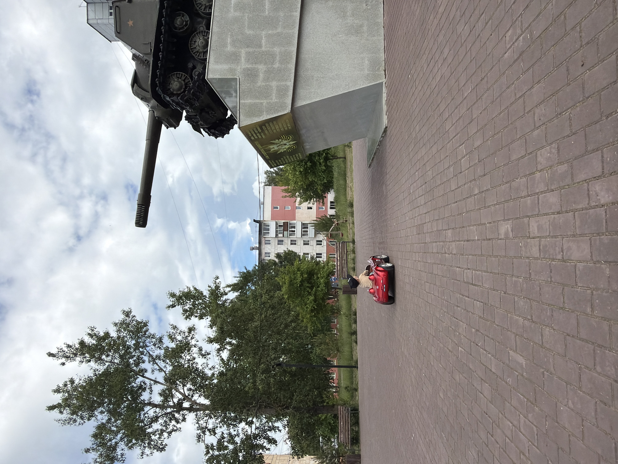 Everyday life captured around Soviet tank memorial in Chaikovsky