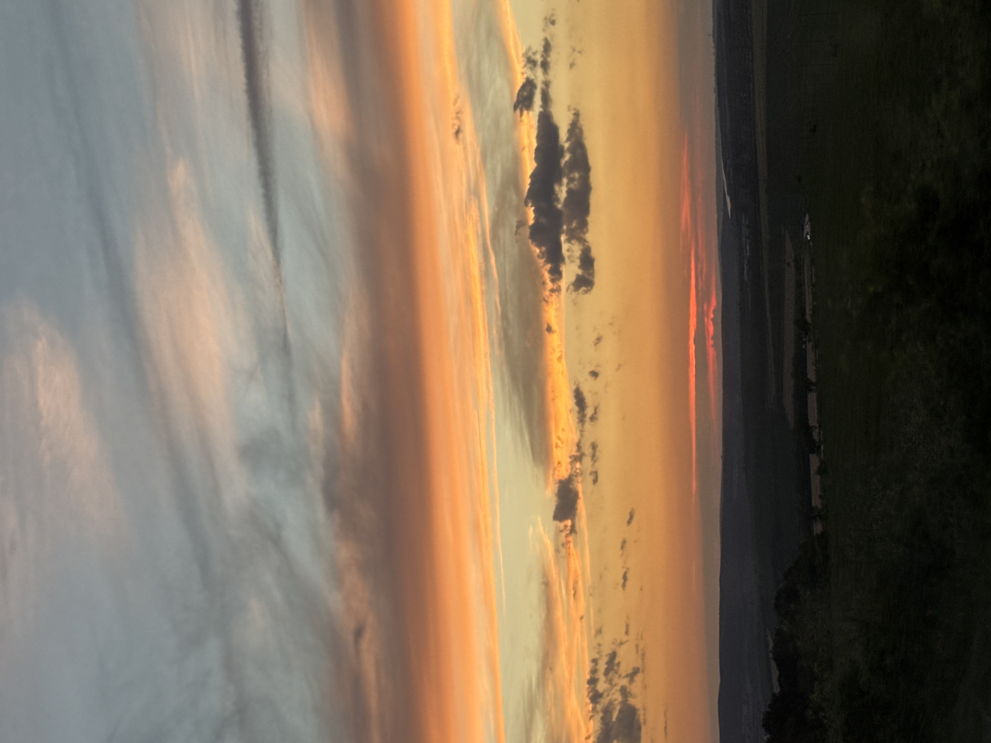 Vivid sunset clouds over rural Buinovo, Bulgaria