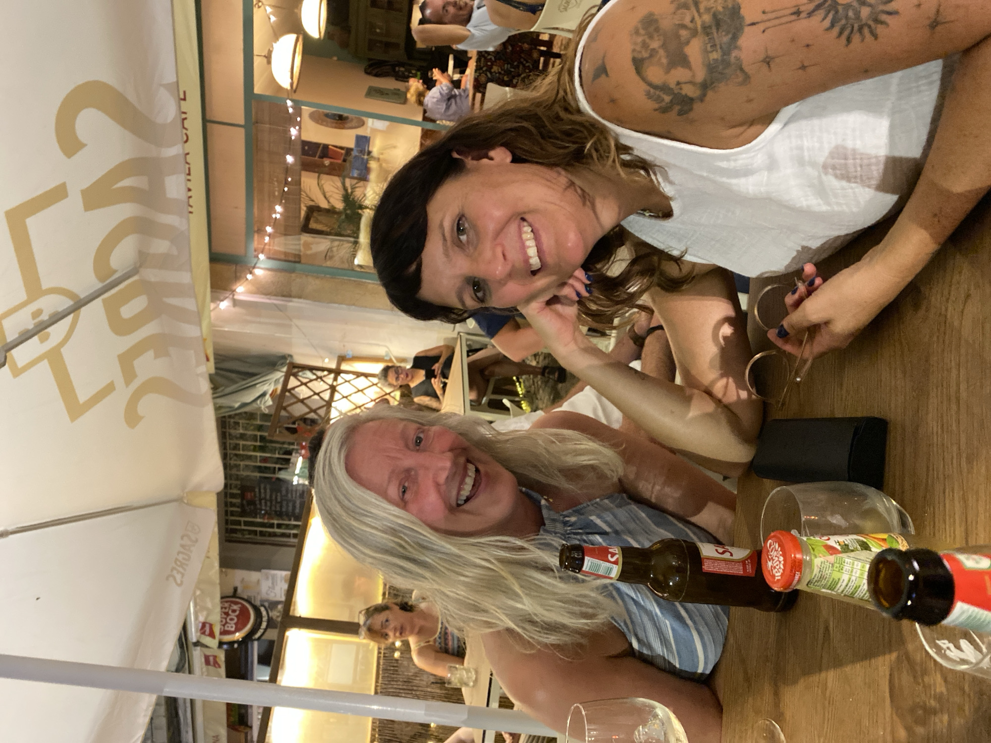 A summer night out at Tavira's riverside cafes and bars