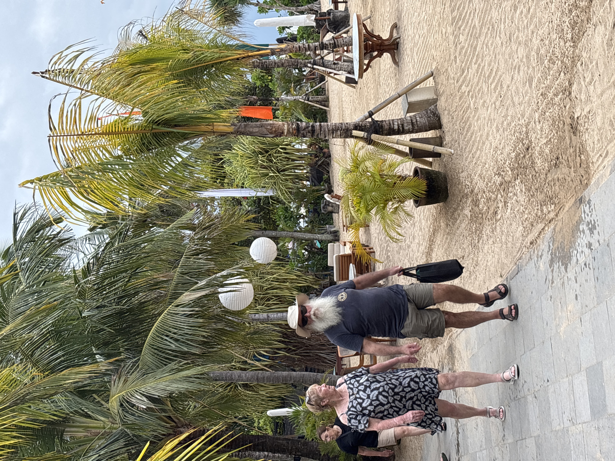 Morning beach walk activity observed in Denpasar, Indonesia