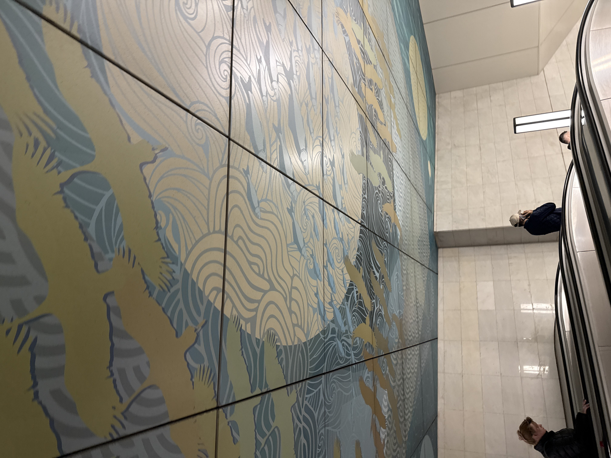 Bird and fish mural documented in Moscow Metro station