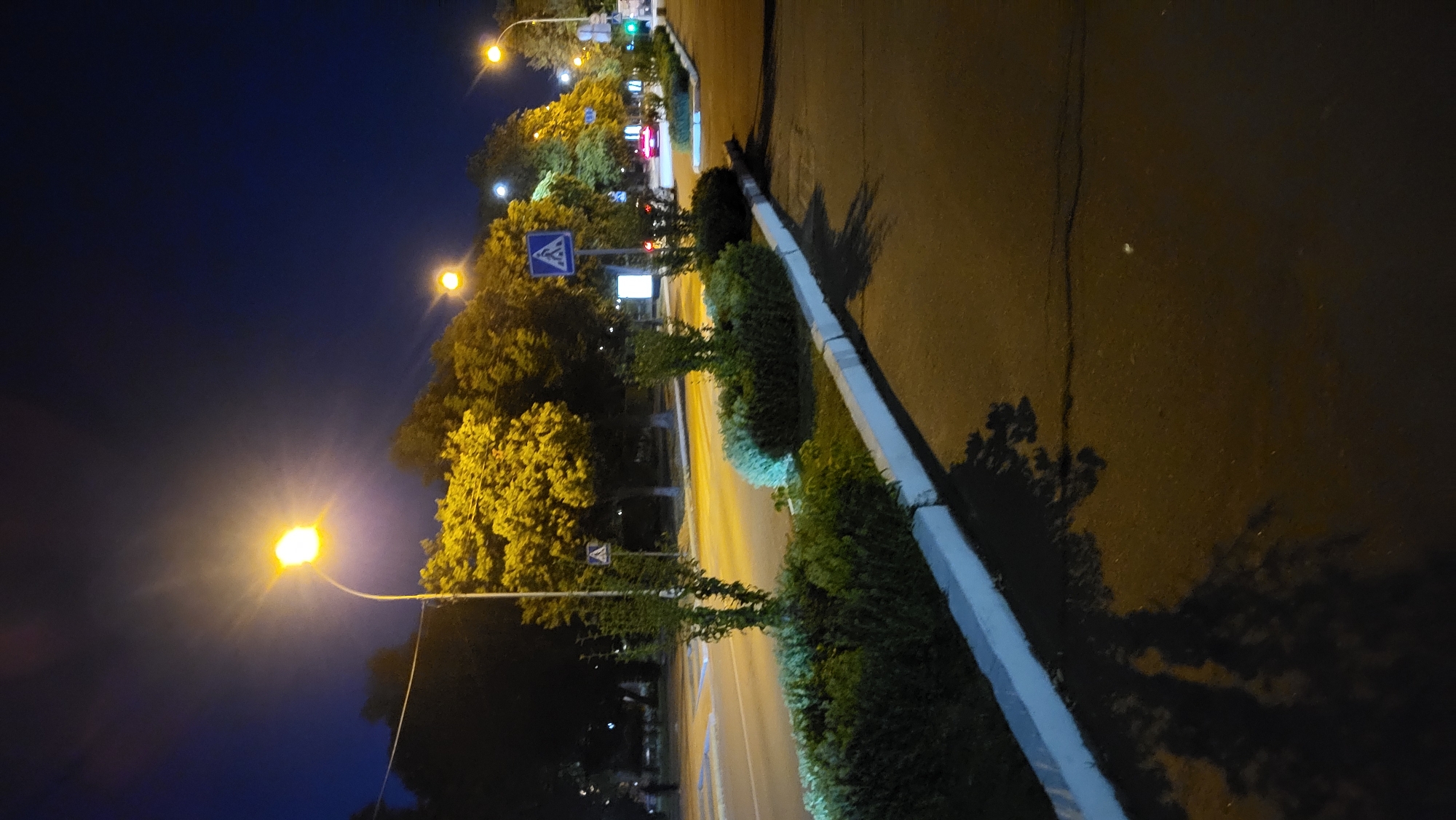 Waterfront dusk to city night: beach, food trucks, and lit streets