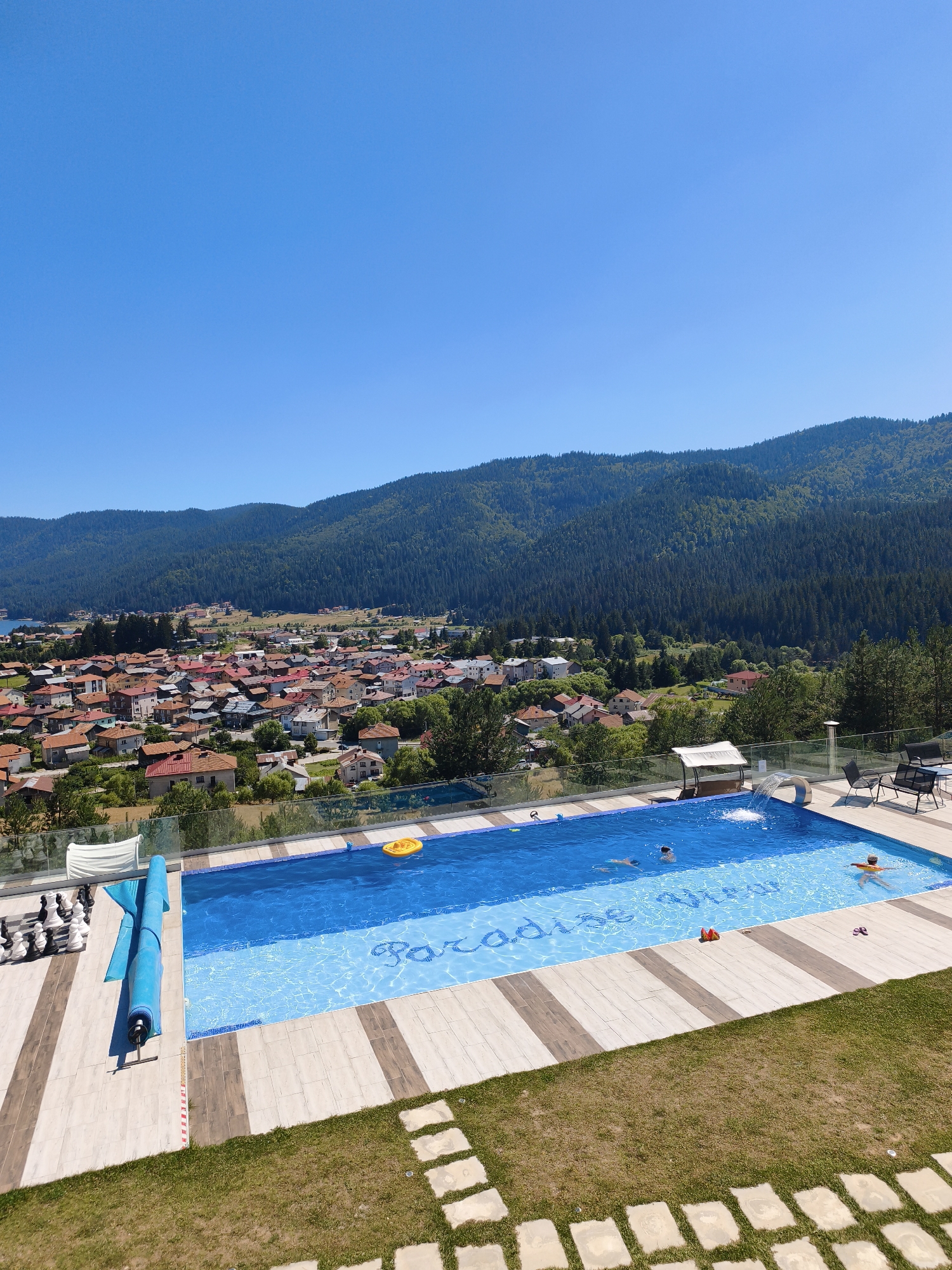 Sarnitsa, Bulgaria: poolside and lakeside views on a clear summer day