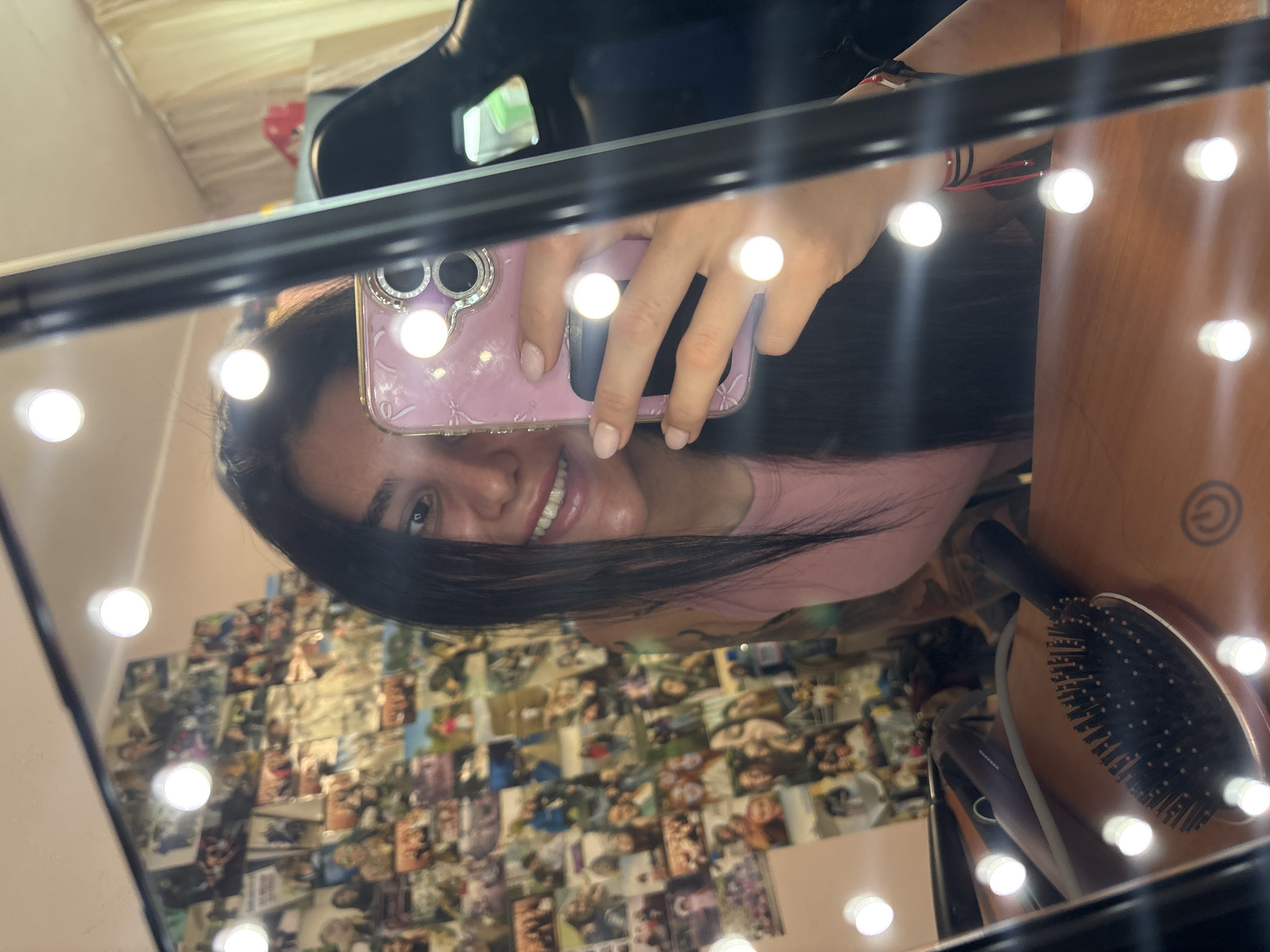 Woman takes selfies at vanity mirror in Veliko Tarnovo