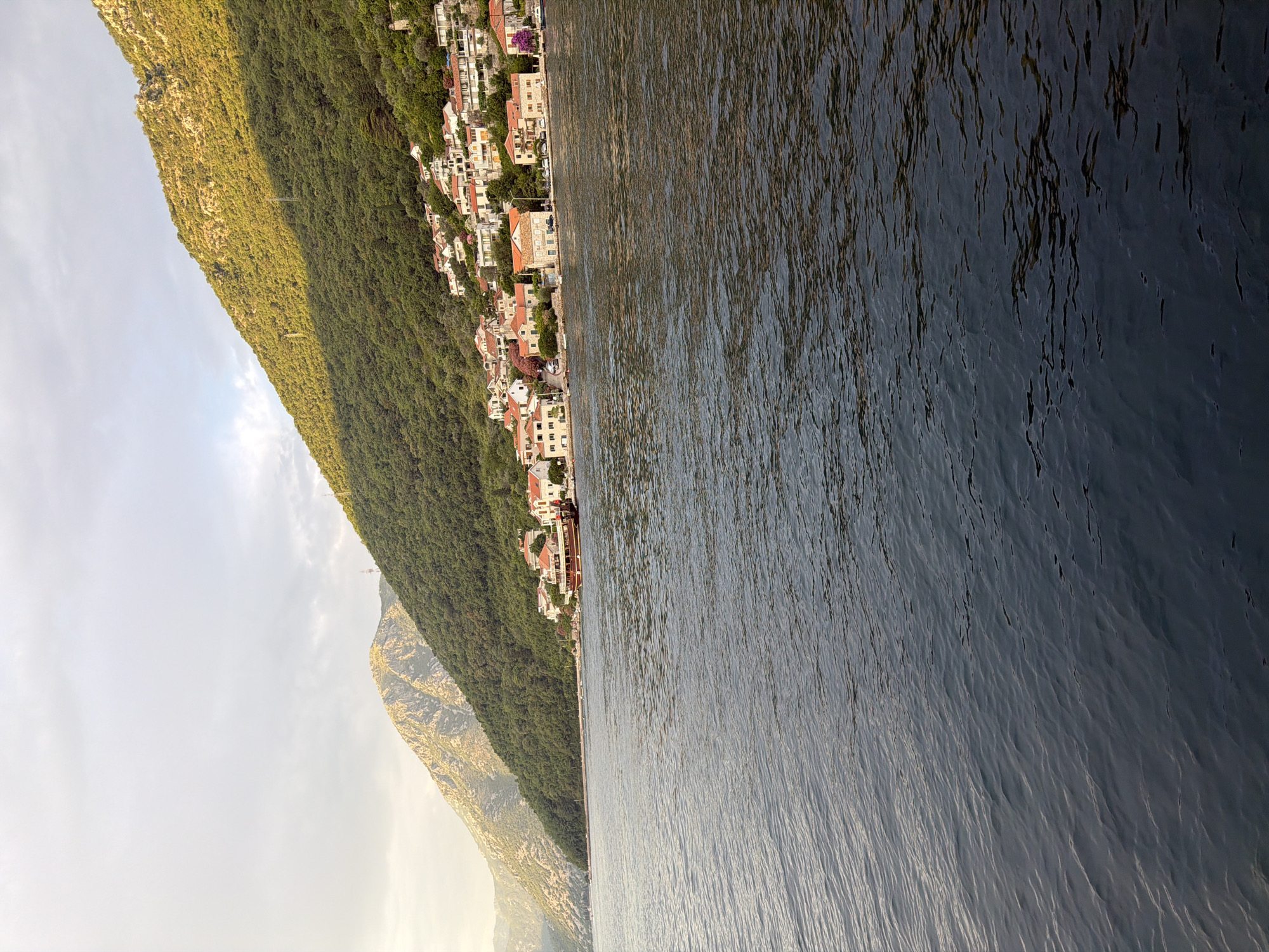 Lepetane ferry crossing the Bay of Kotor at evening