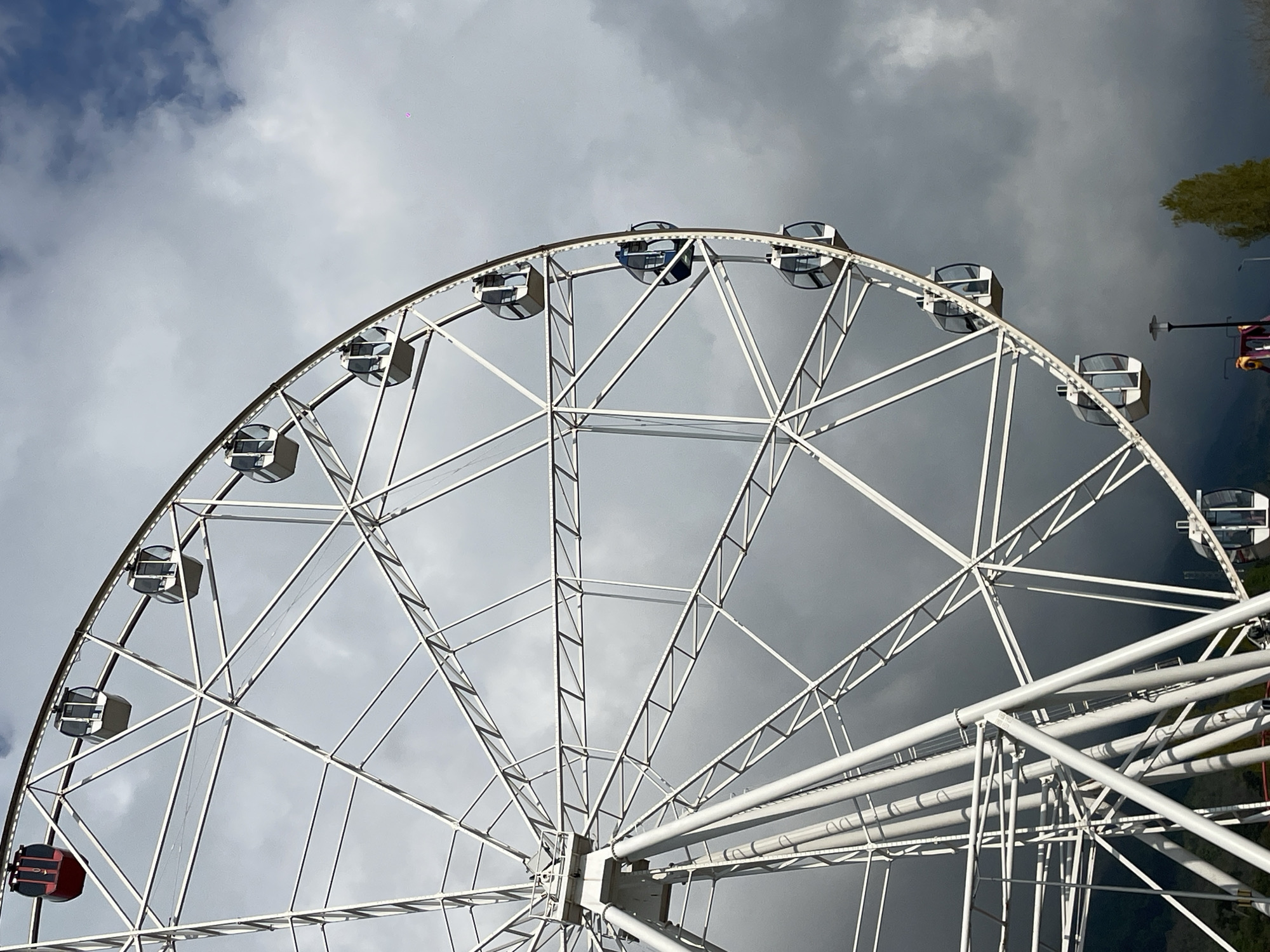 Spring scenes documented at Gagra waterfront featuring Ferris wheel
