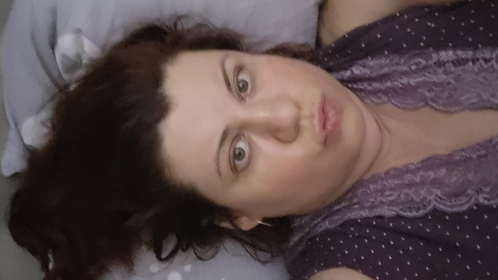 Person resting on bed observed in Татарка, Russia