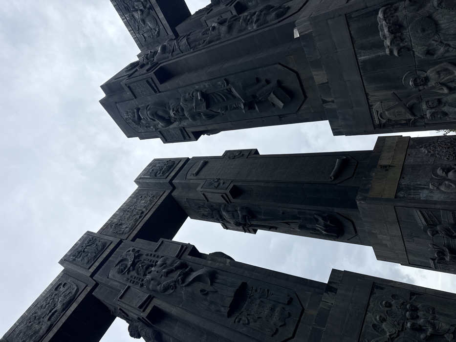 Tourist documents Chronicle of Georgia monument, Tbilisi landmarks