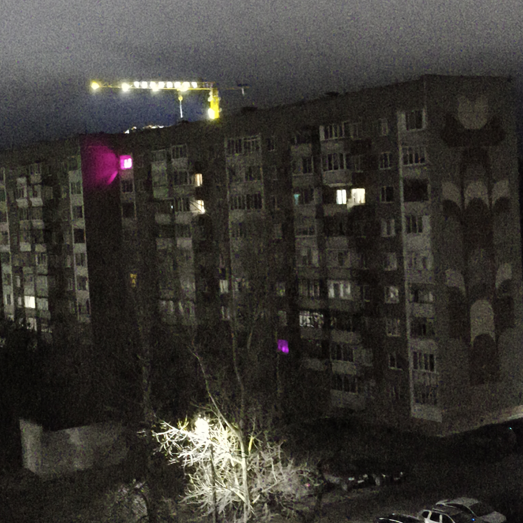 Nighttime construction activity illuminates Chaikovsky apartment district