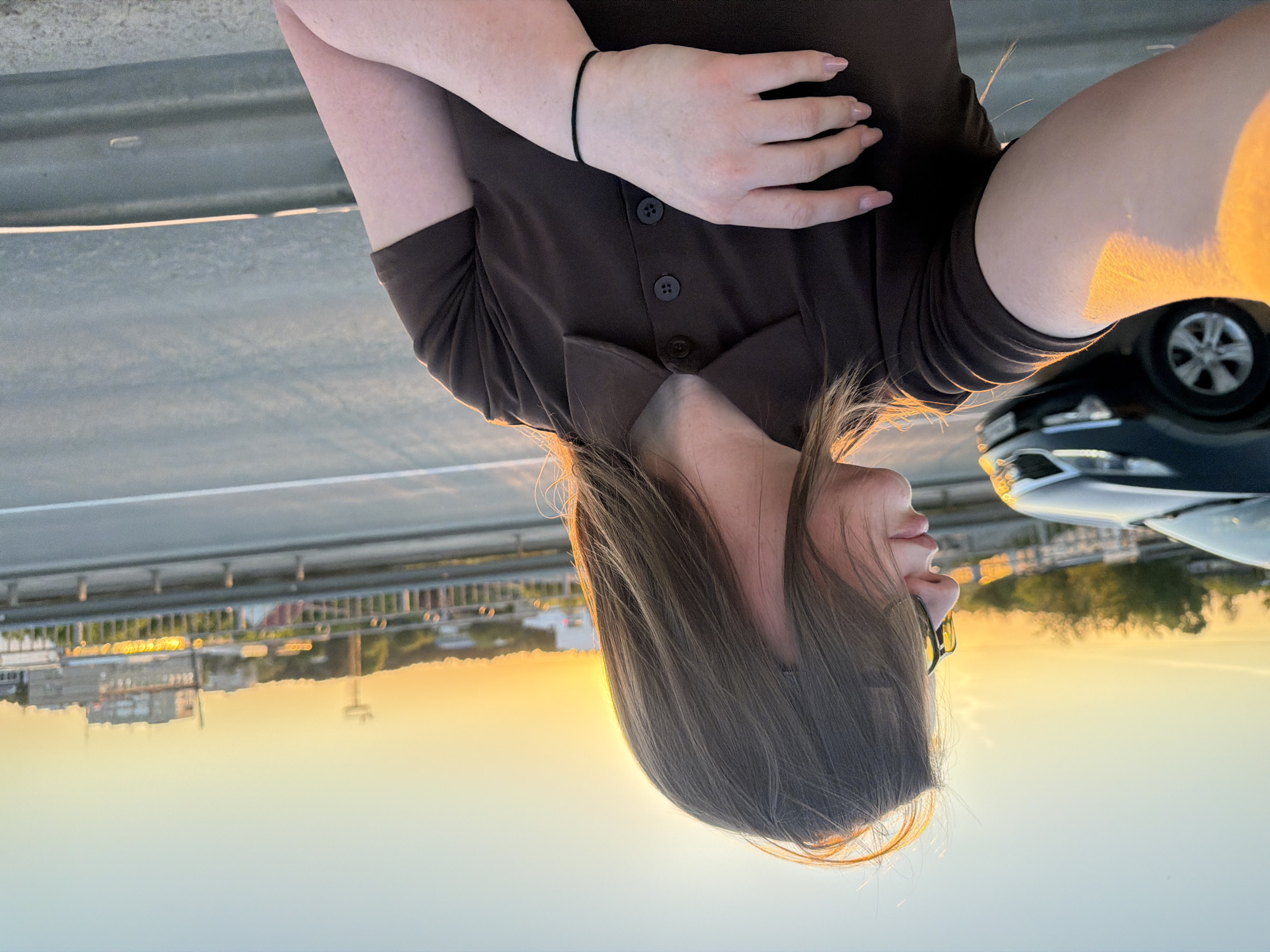 Woman captures sunset selfie session in Chaikovsky, Russia