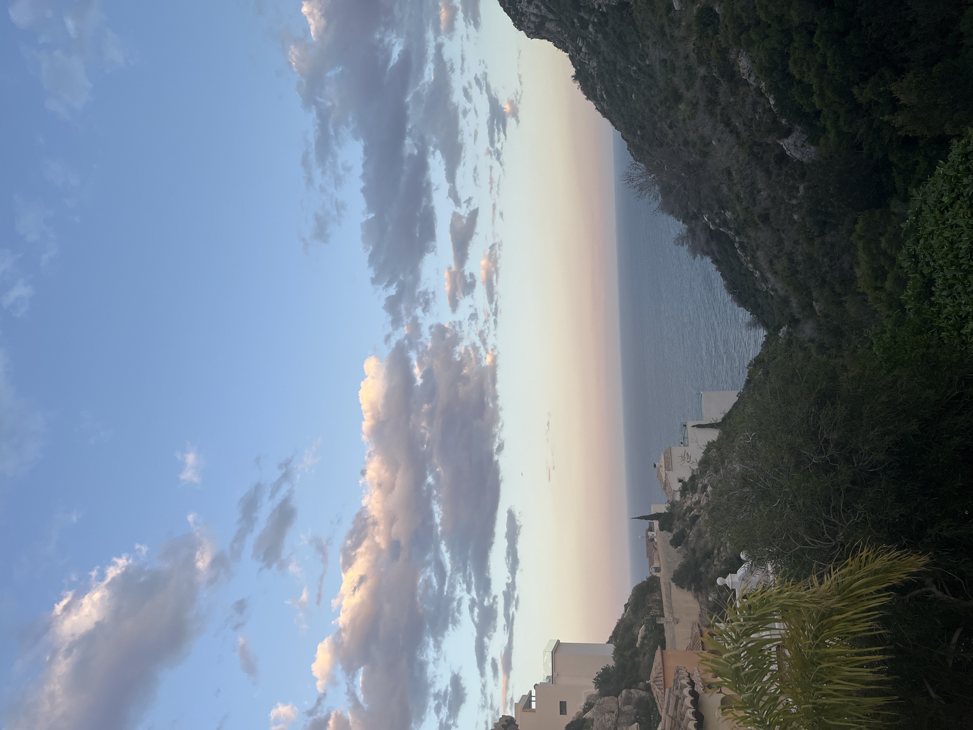 Dramatic dusk skies captured over Spanish coastal town