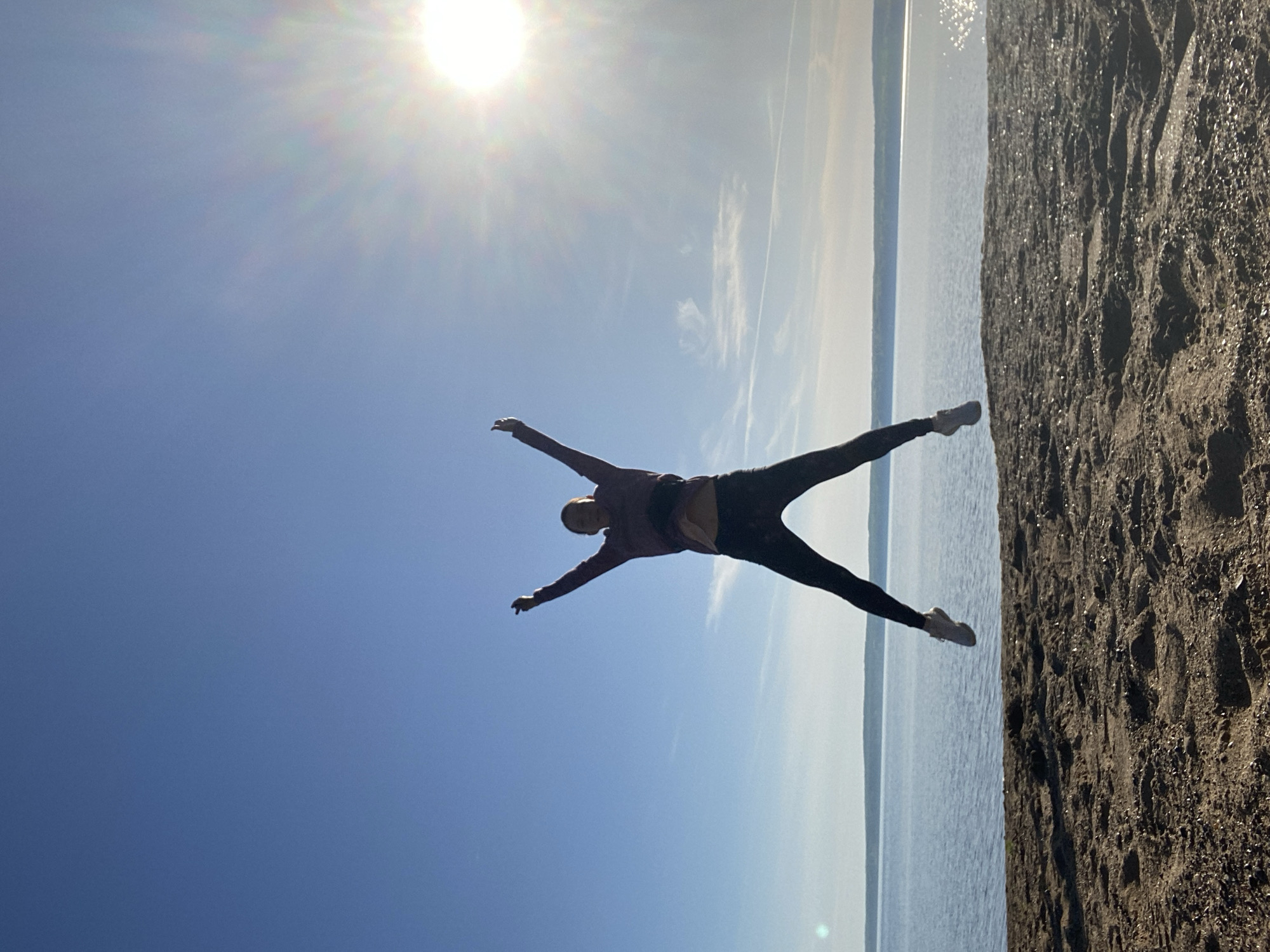 Woman exercises along Kama River waterfront in Chaikovsky, Russia
