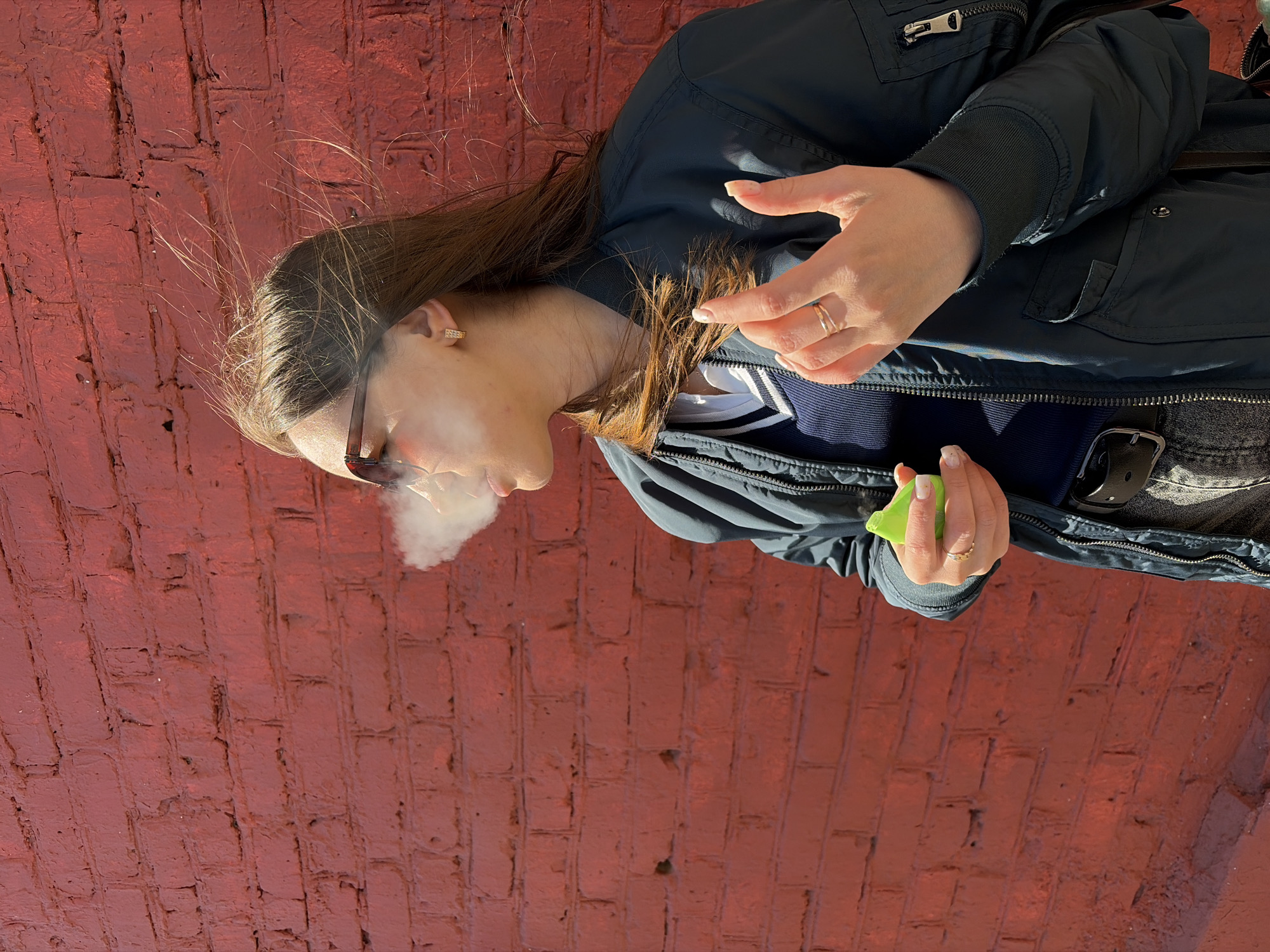 Women conduct photo session at Izhevsk murals and streetscapes
