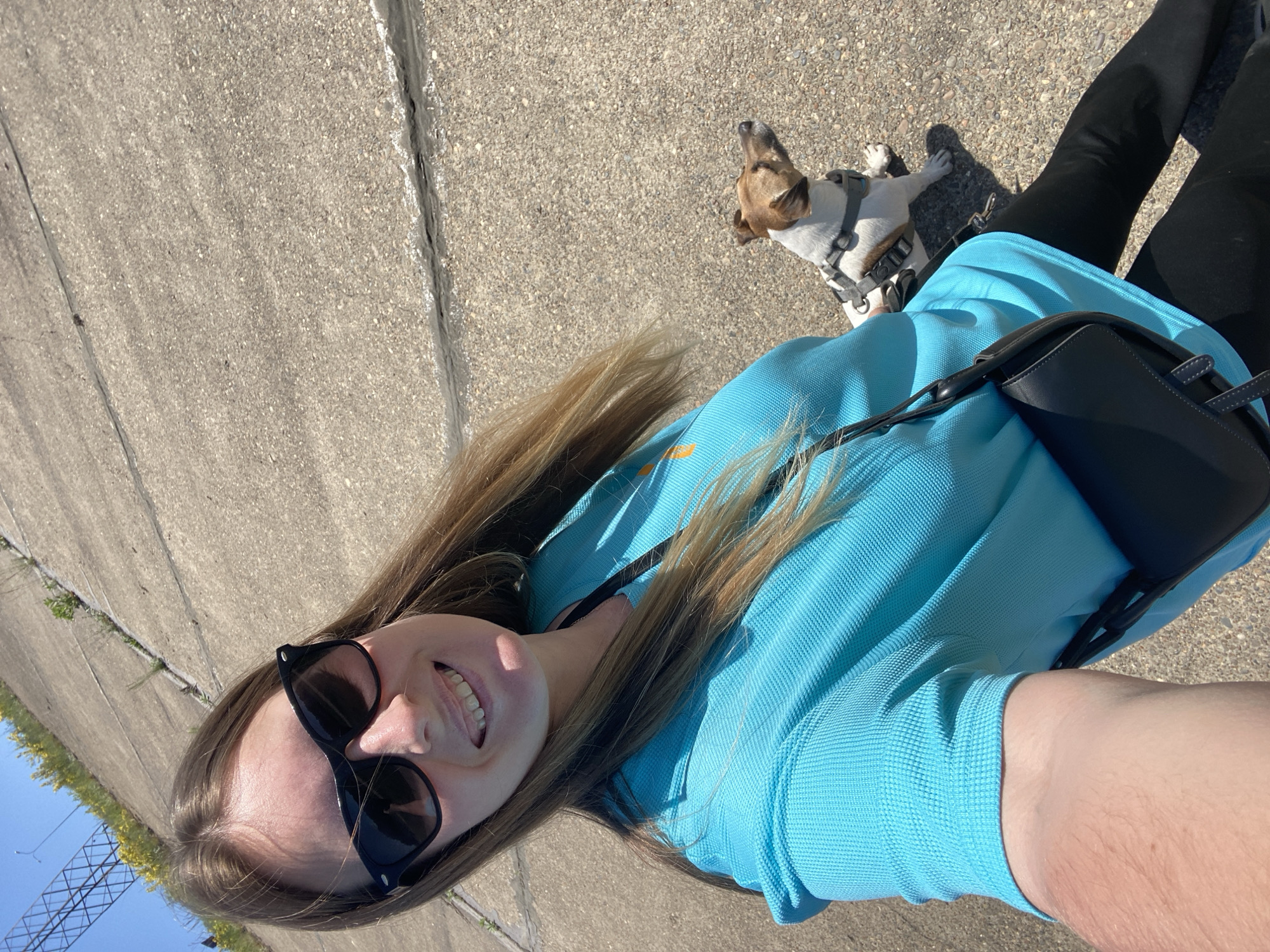 Woman takes morning selfies with dog in Russian town