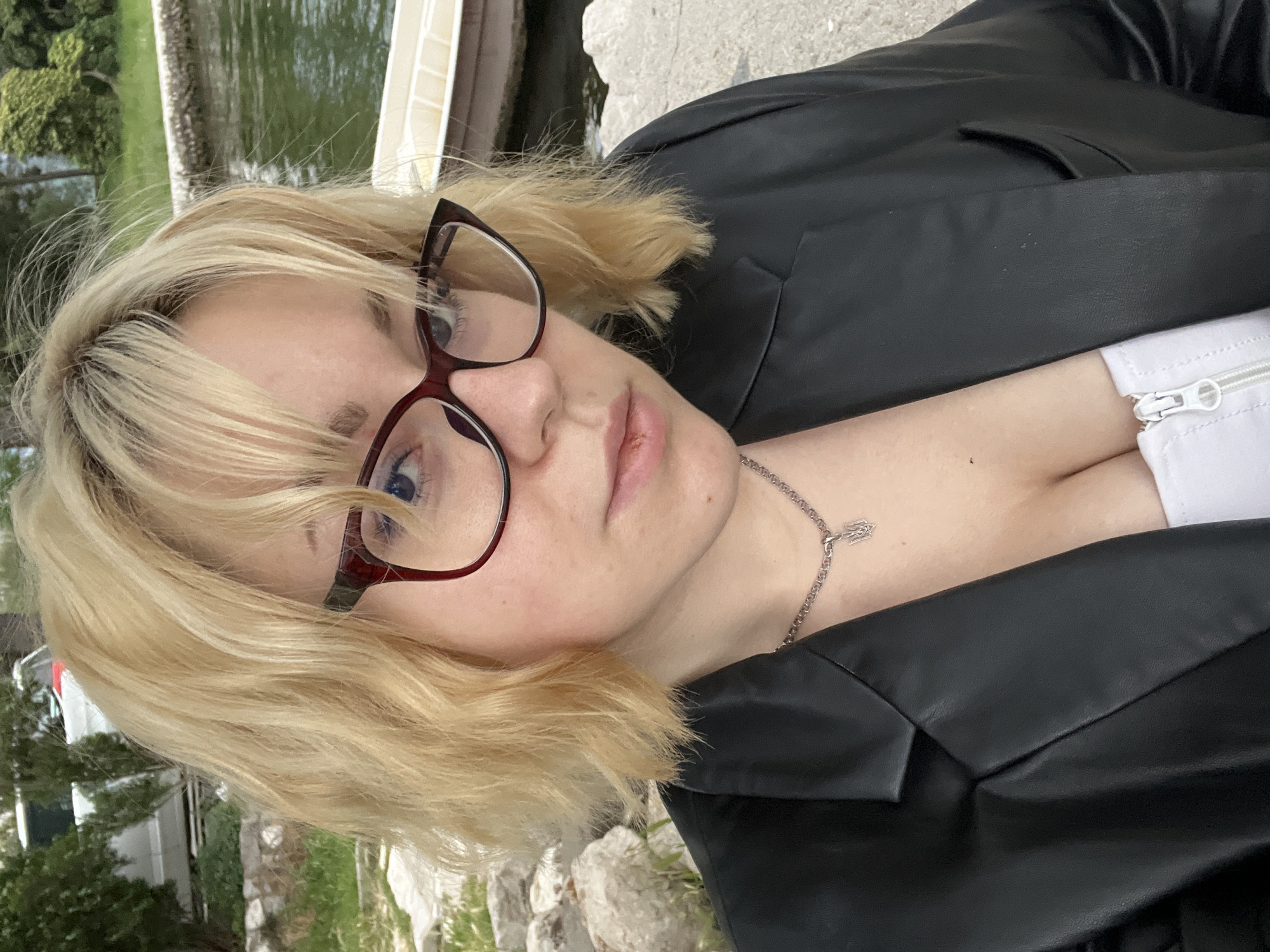 Woman photographed amid Bay of Kotor scenes in Dobrota