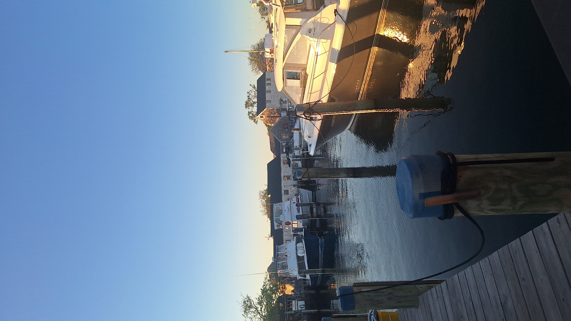 Sunset harbor views from Nantucket marina and wooden piers