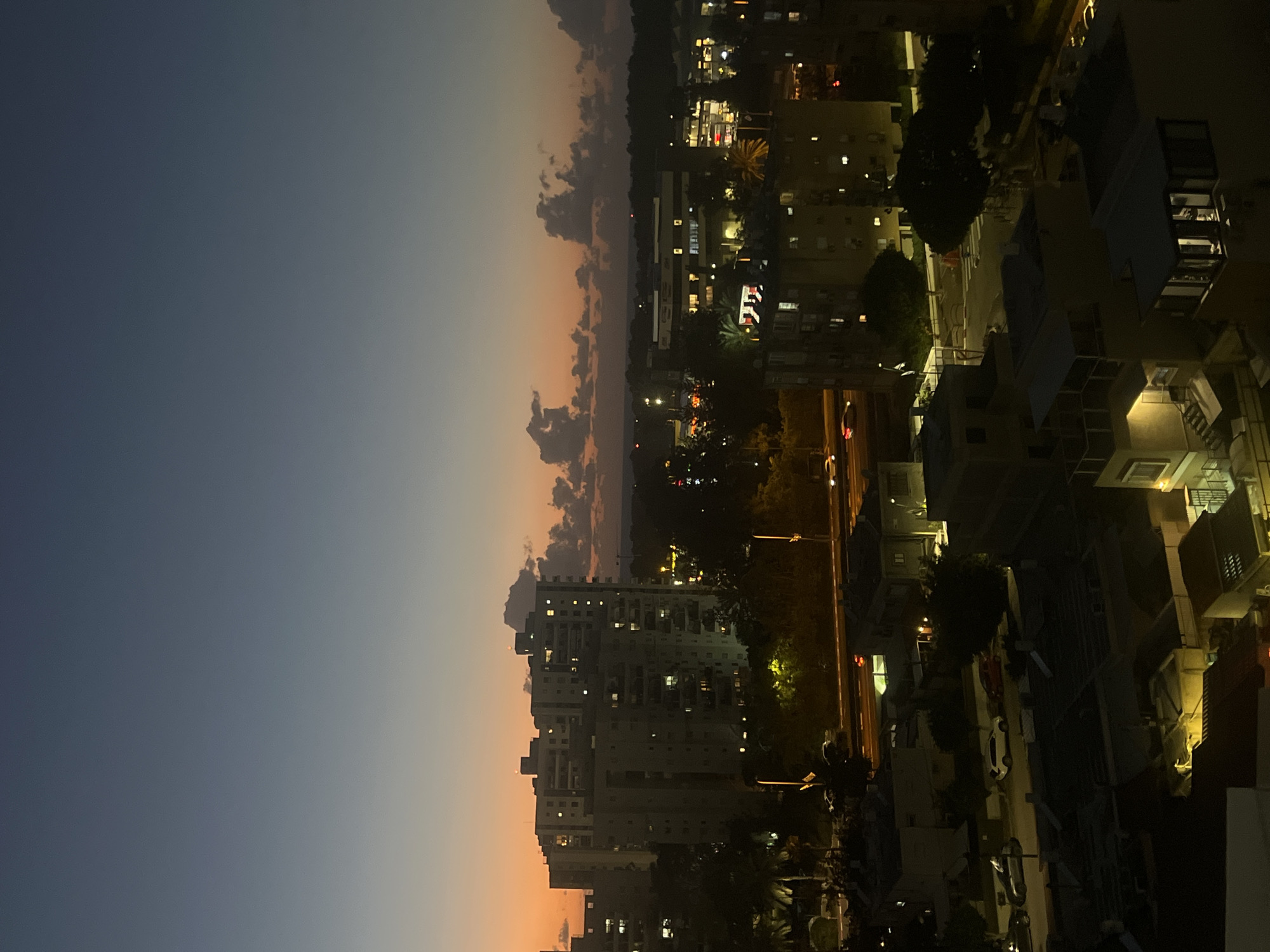 Nighttime aerial views captured over illuminated Kiryat Bialik skyline