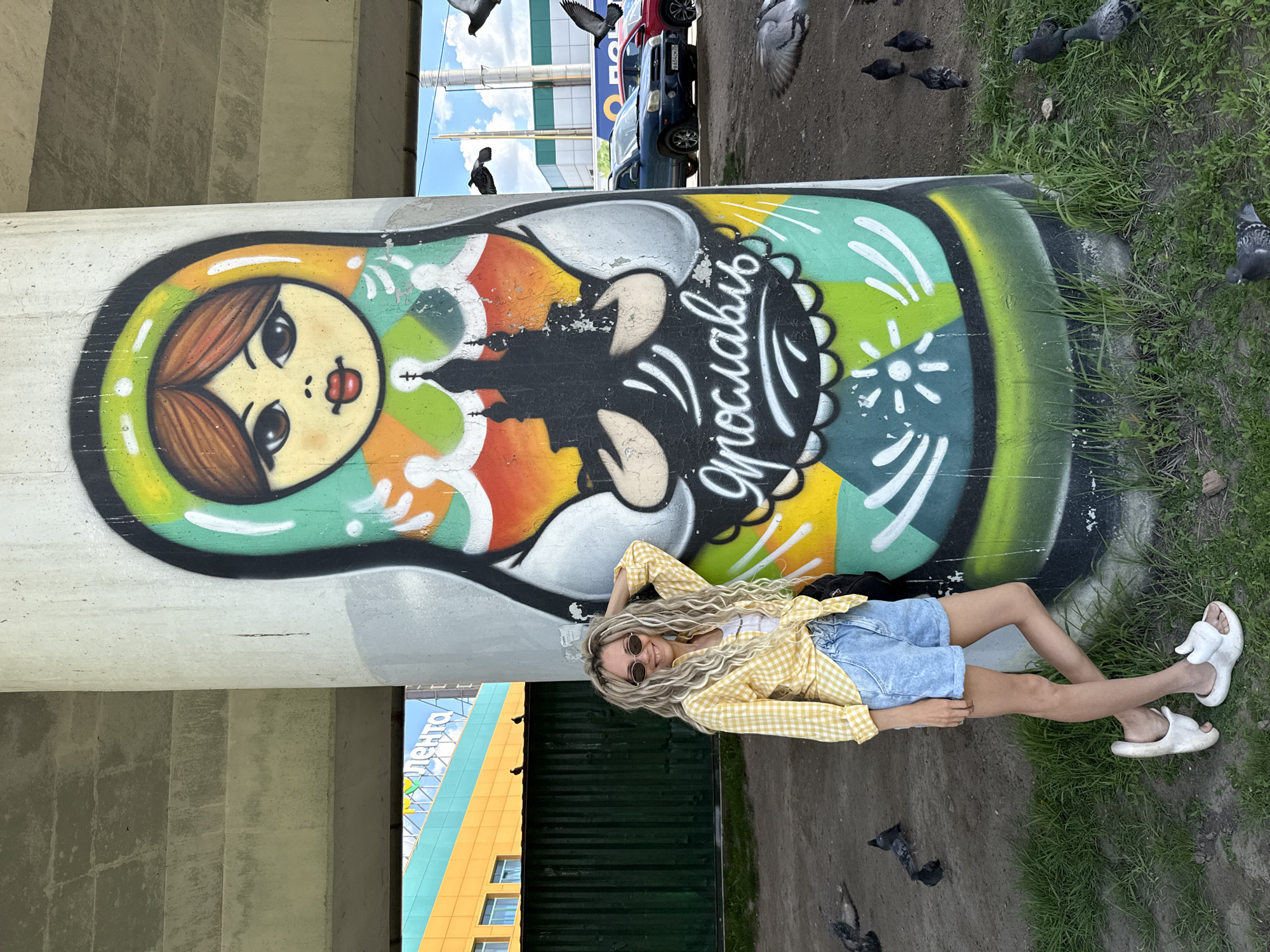 Woman in yellow shirt spotted across Russian towns during morning