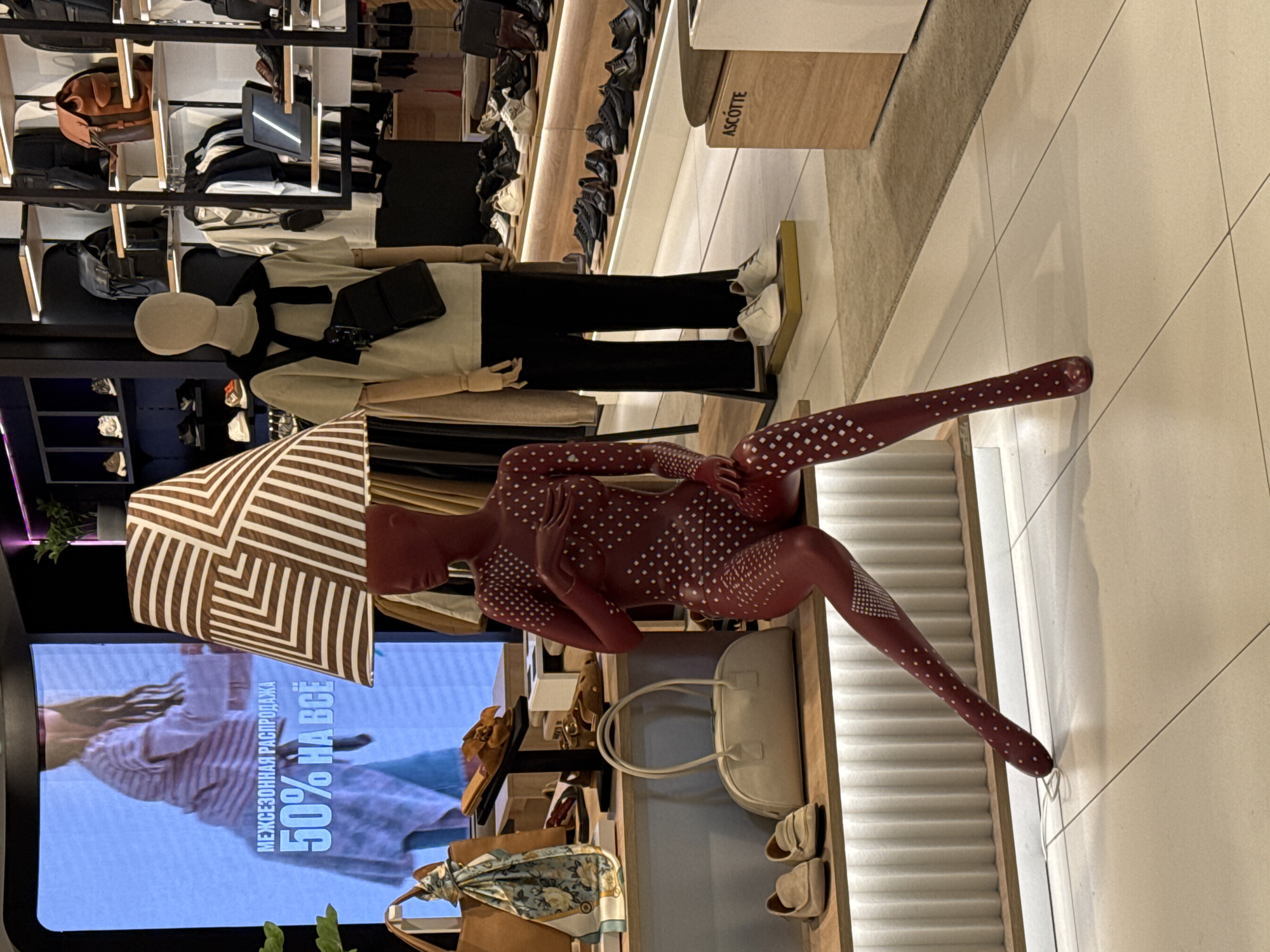 Retail store interior observed in Kudrovo displaying merchandise