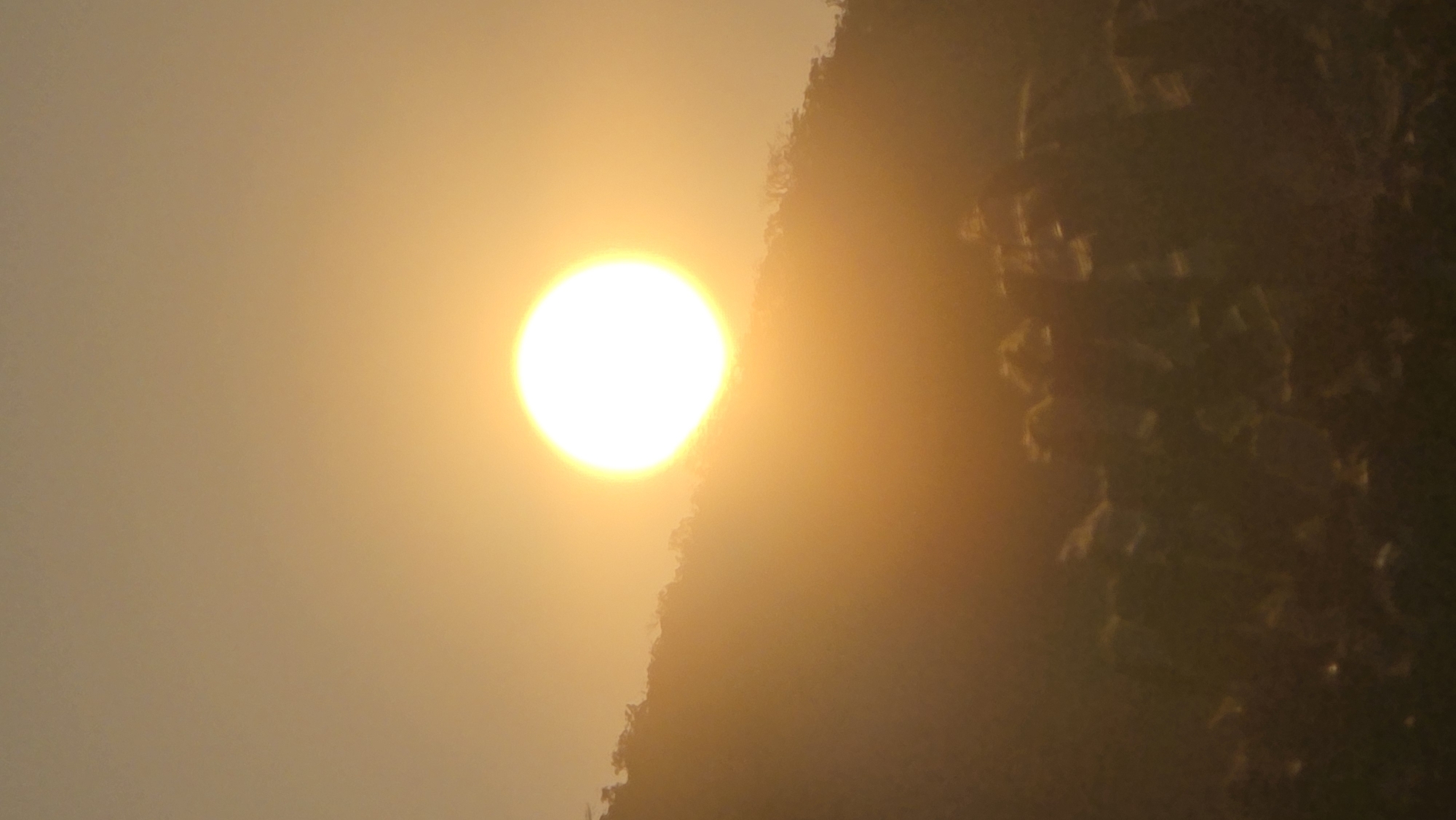 Hazy sunset landscape captured at Vietnam natural heritage site