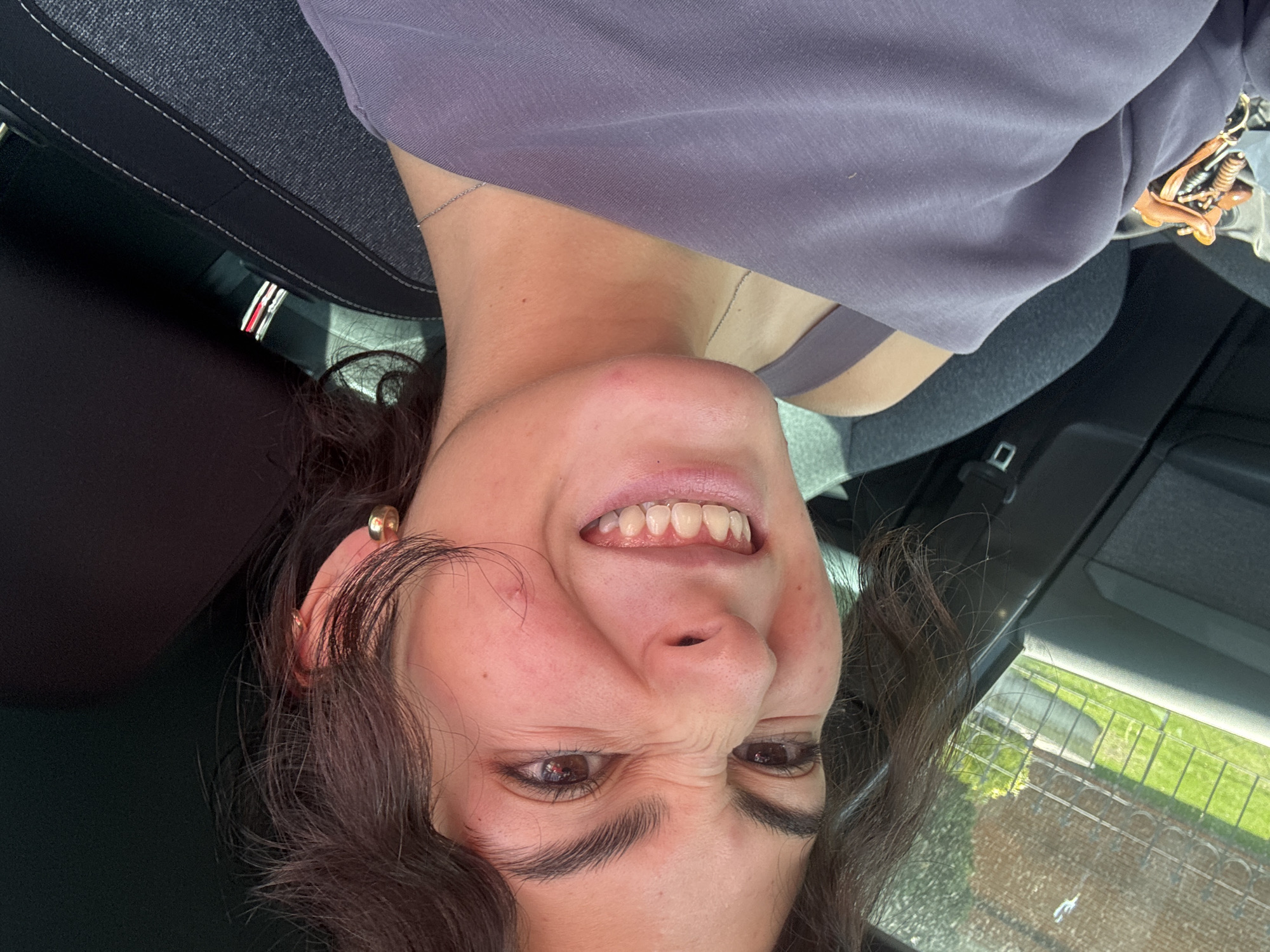 Woman takes selfies in car in Mexican town