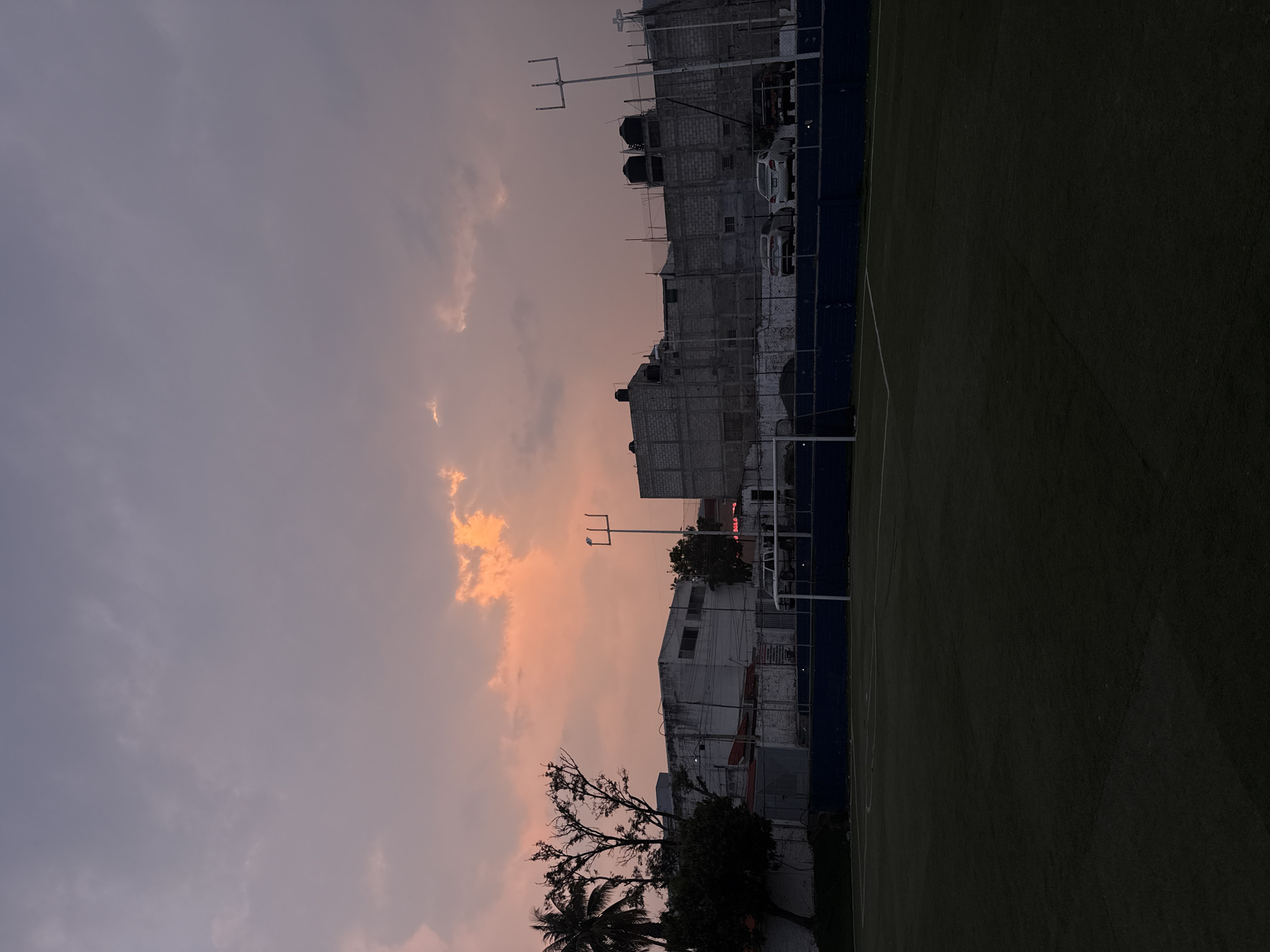 Dusk cityscape documented over soccer field in Tuxtla Gutiérrez