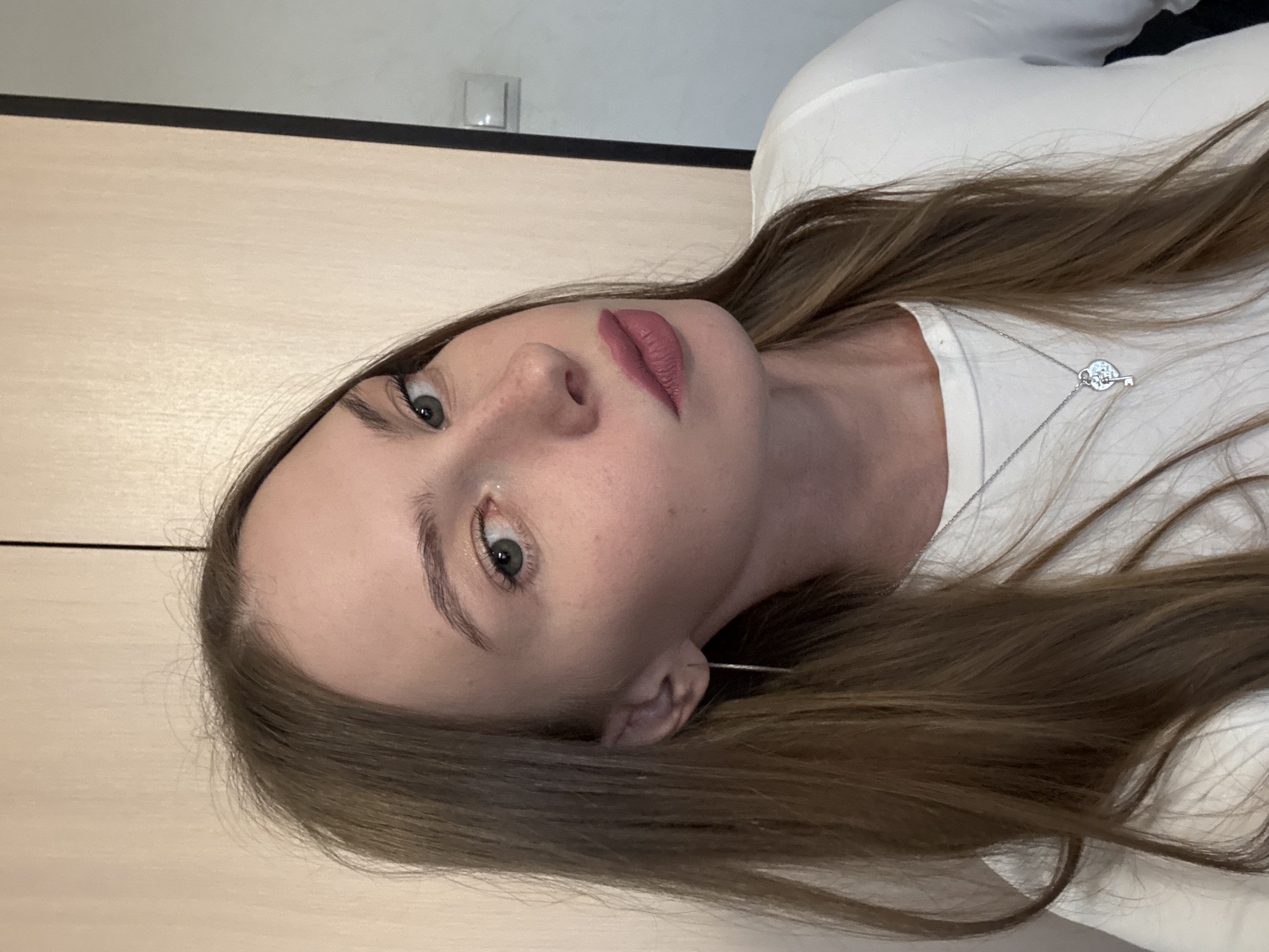 Selfie session in Perm, white top and silver jewelry throughout