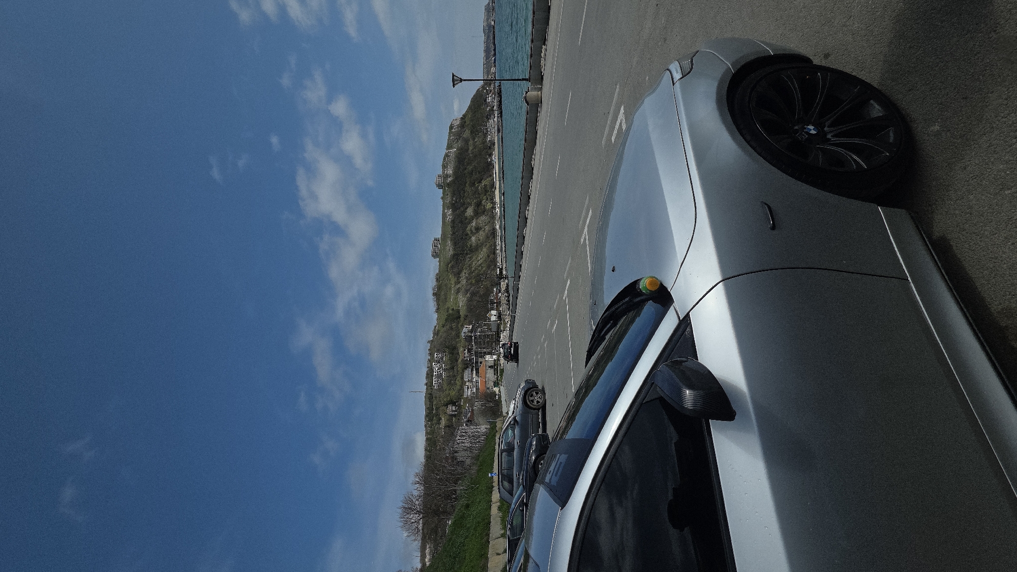 Silver BMW parked near Black Sea in Kavarna, Bulgaria