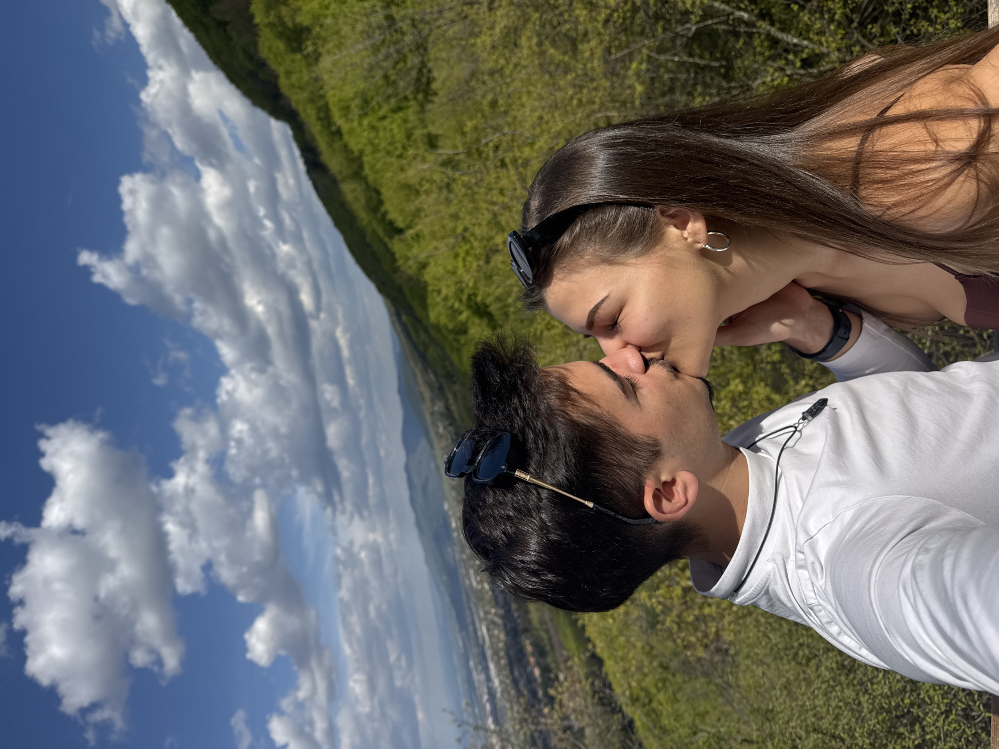 Couple shares romantic moments on Sofia scenic overlook platform