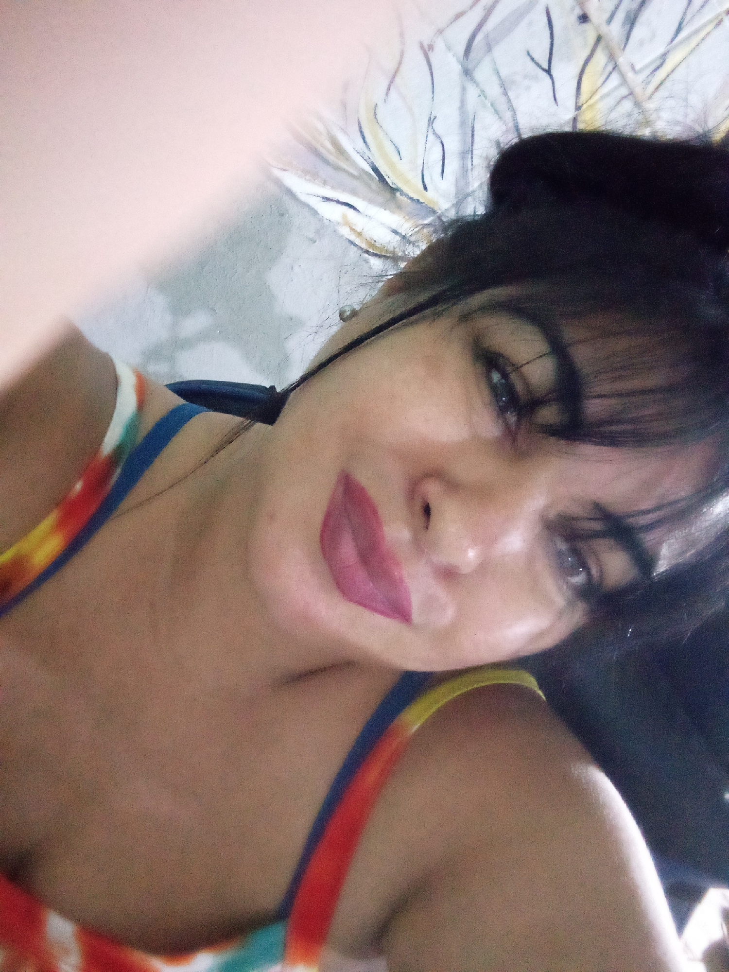 Woman takes morning selfie in Juan Griego, Venezuela